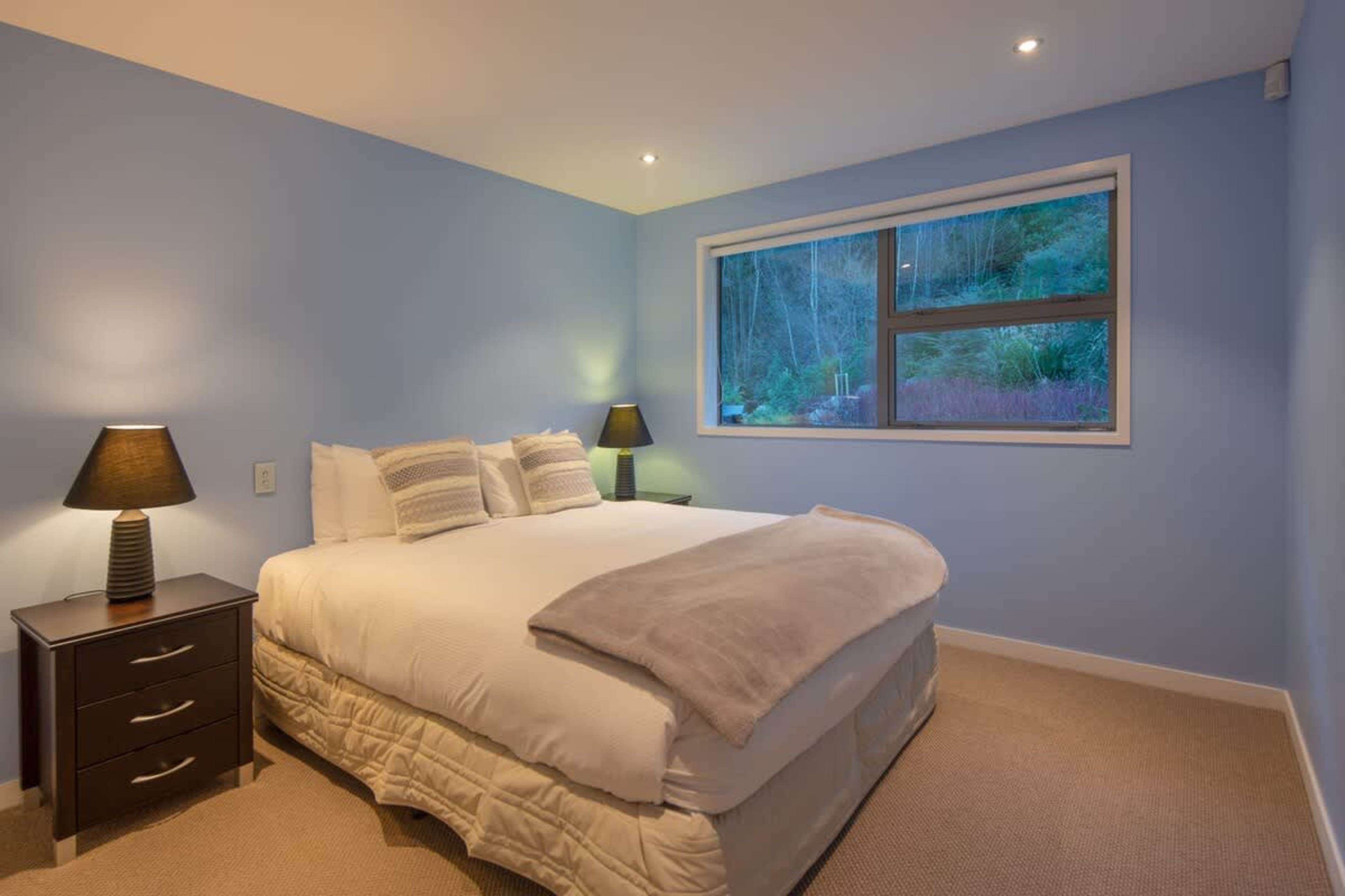 Charming Third Bedroom for Restful Retreats – Relax in this beautifully decorated third bedroom, offering a super king bed that caters to your needs, ensuring a peaceful and rejuvenating stay.