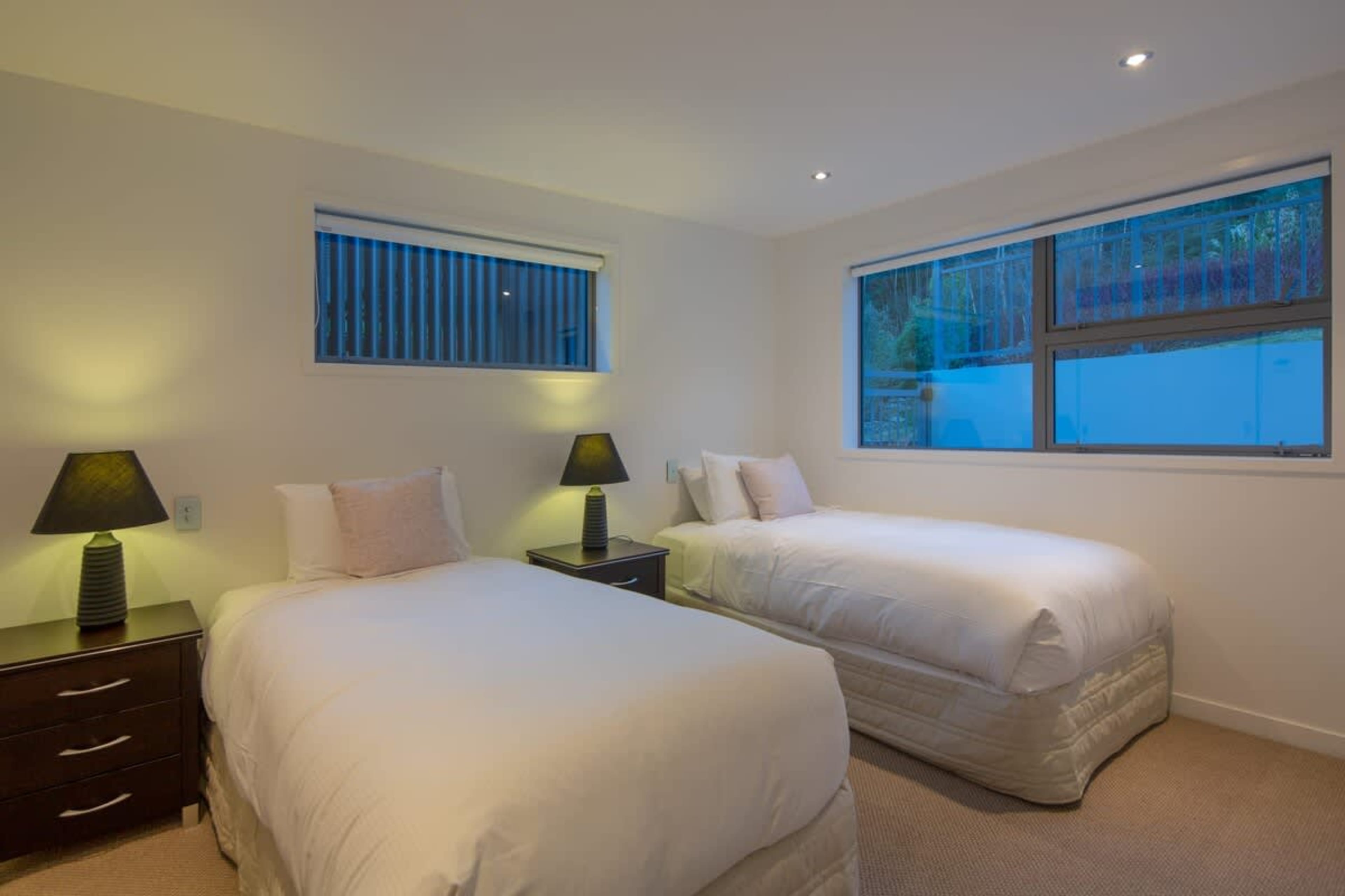 Flexible Fourth Bedroom with Super King or King Singles – This stylish bedroom offers a super king bed that can be converted into two king singles, providing versatile sleeping arrangements for your group.