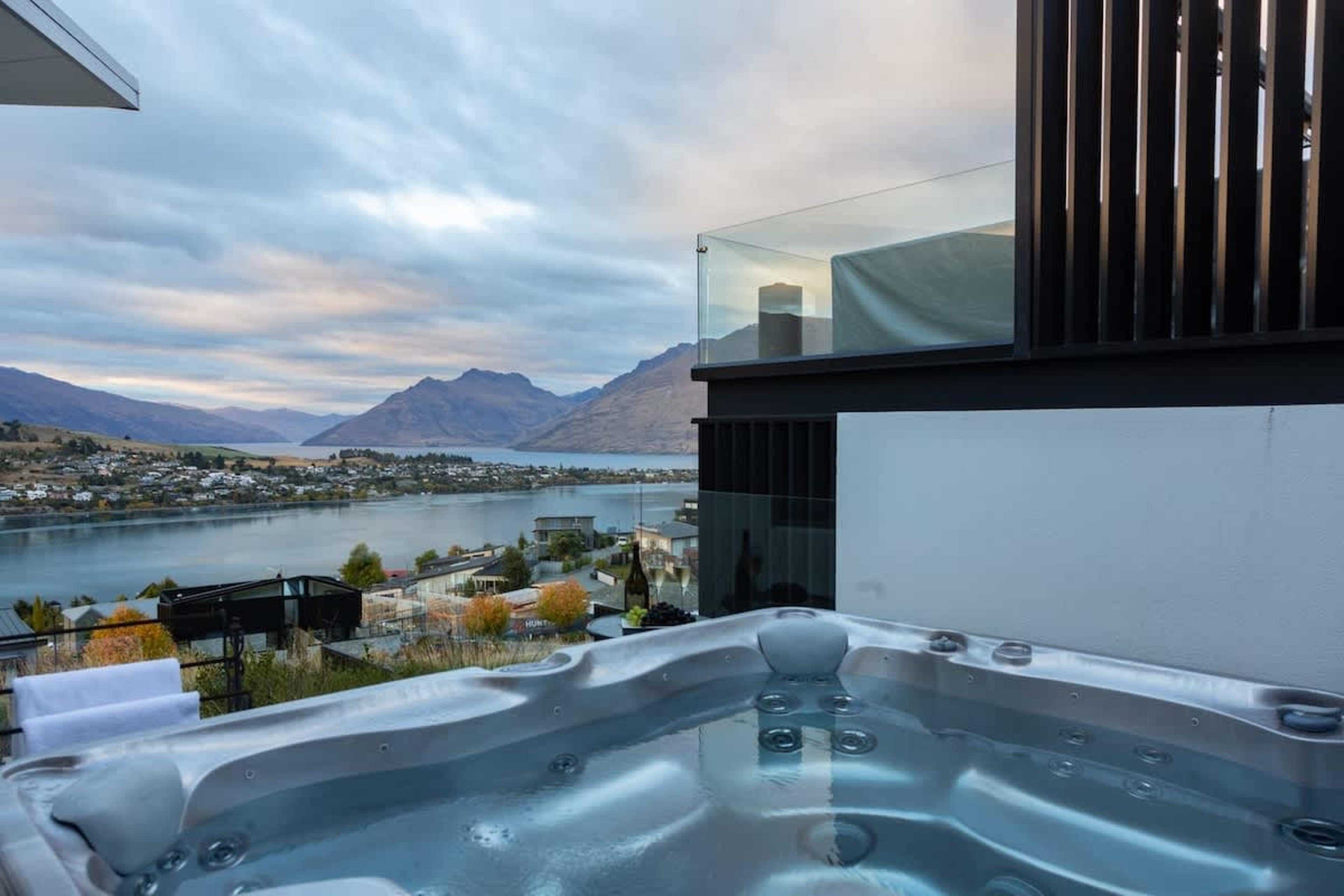 Private Outdoor Hot Tub with Scenic Views – Unwind in this spacious hot tub, surrounded by serene landscapes, ideal for star-gazing or soaking in the sunset after a day of adventure.