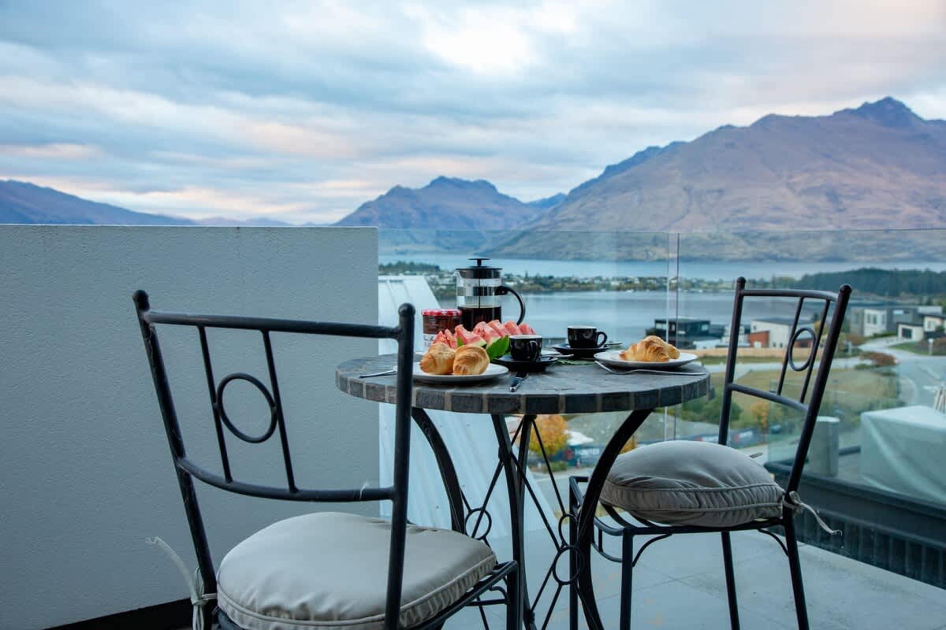 Exclusive Balcony Retreat – Enjoy the tranquility of your private balcony off the master bedroom, offering luxurious outdoor seating and breathtaking vistas of the lake and mountains.