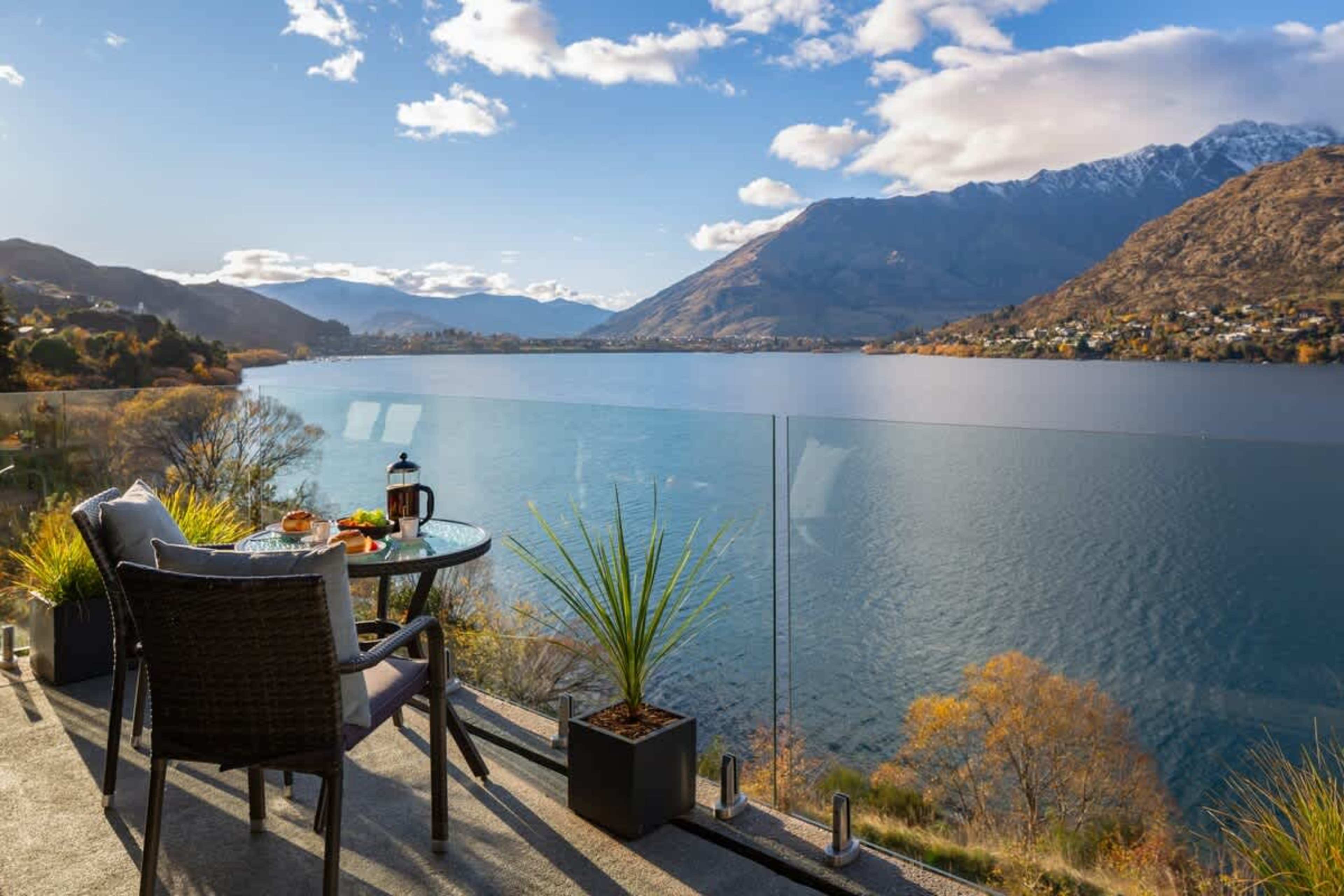 Perfect Patio for Relaxation – Take in the spectacular lake views from the patio, with comfortable seating and a BBQ for al fresco dining.