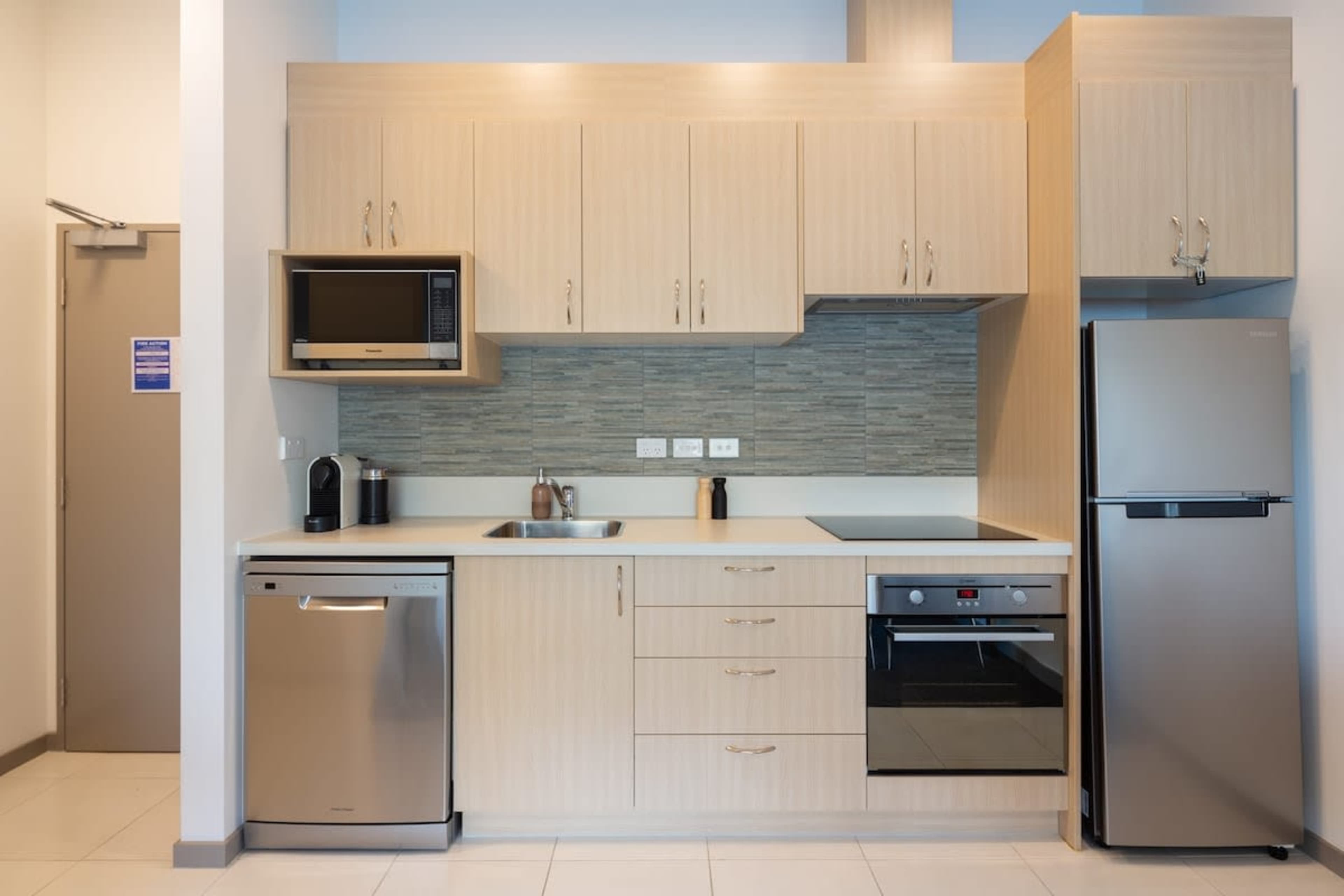 Fully Equipped Kitchen with Lake Views – This modern kitchen features high-end appliances, ample counter space, and stunning views of the lake, making meal prep a pleasure.
