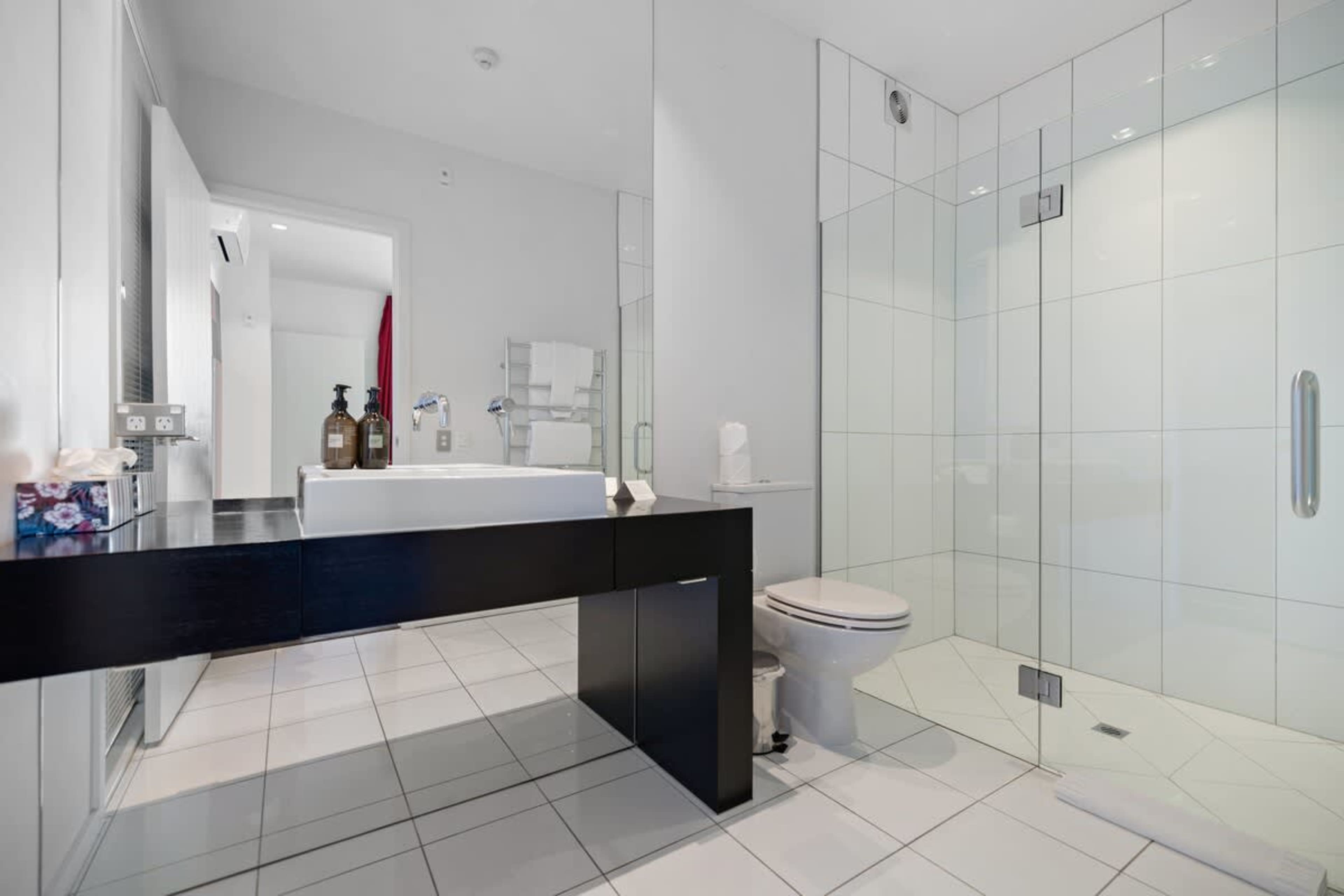 Third Bathroom with Heated Floors
Experience comfort in the third bathroom, featuring sleek design and heated floors for a cozy and luxurious feel, perfect for relaxing after a day in Queenstown.