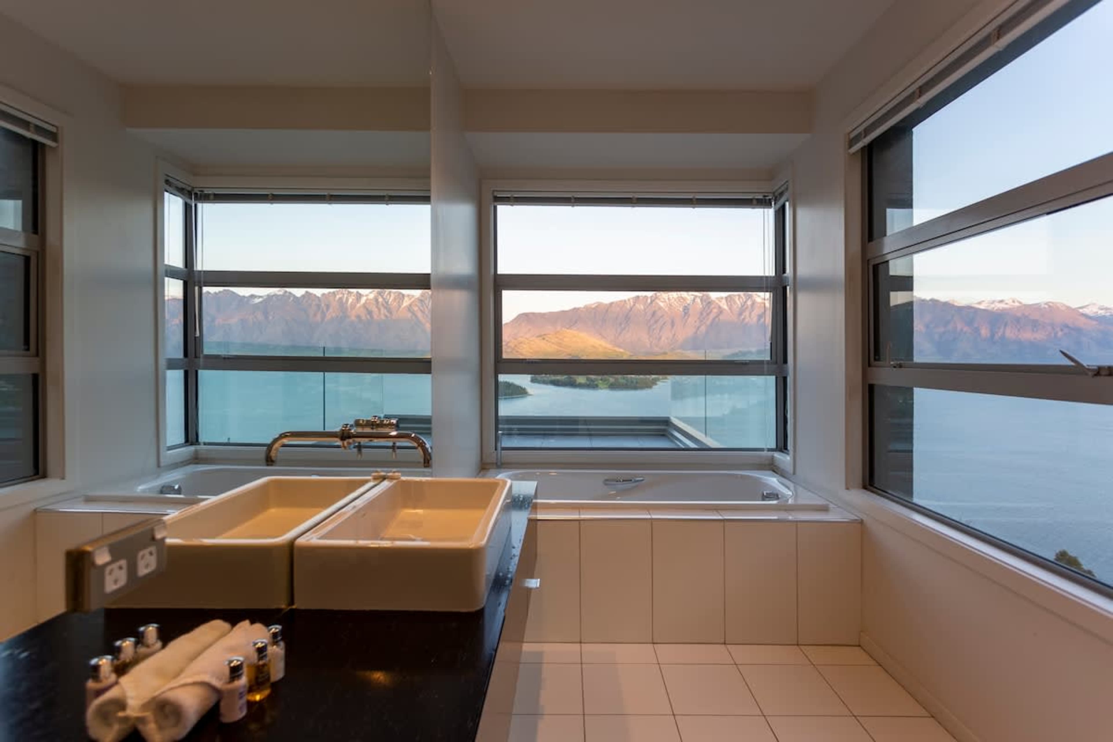
Luxurious Master Bathroom
Relax in the spacious master bathroom, complete with a walk-in shower, freestanding bath, heated floors, and panoramic views, offering a tranquil space to unwind in Queenstown luxury.