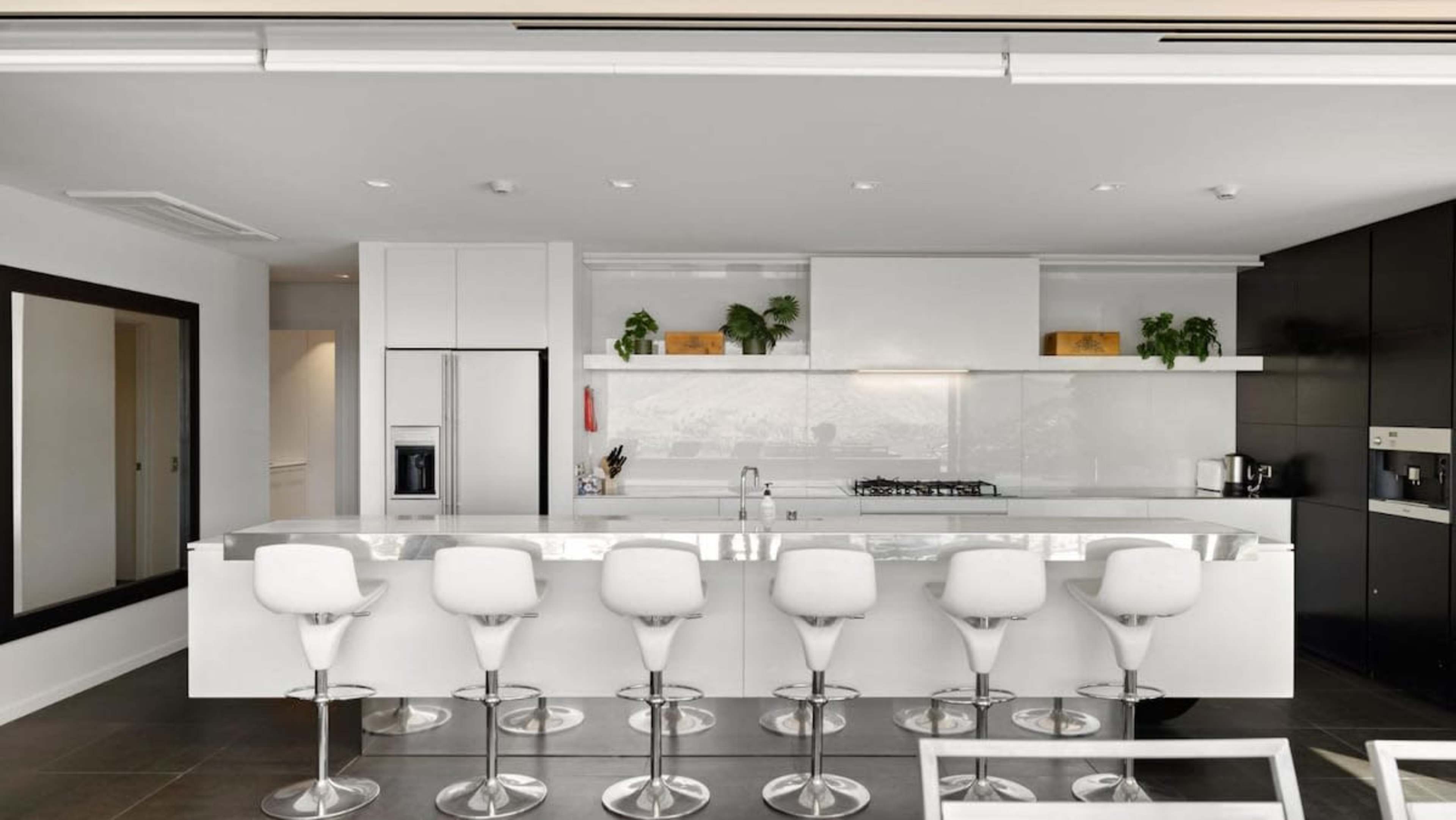Gourmet Kitchen
Cook like a chef in the state-of-the-art kitchen, featuring top-tier appliances, sleek cabinetry, and a spacious layout perfect for preparing meals in style.