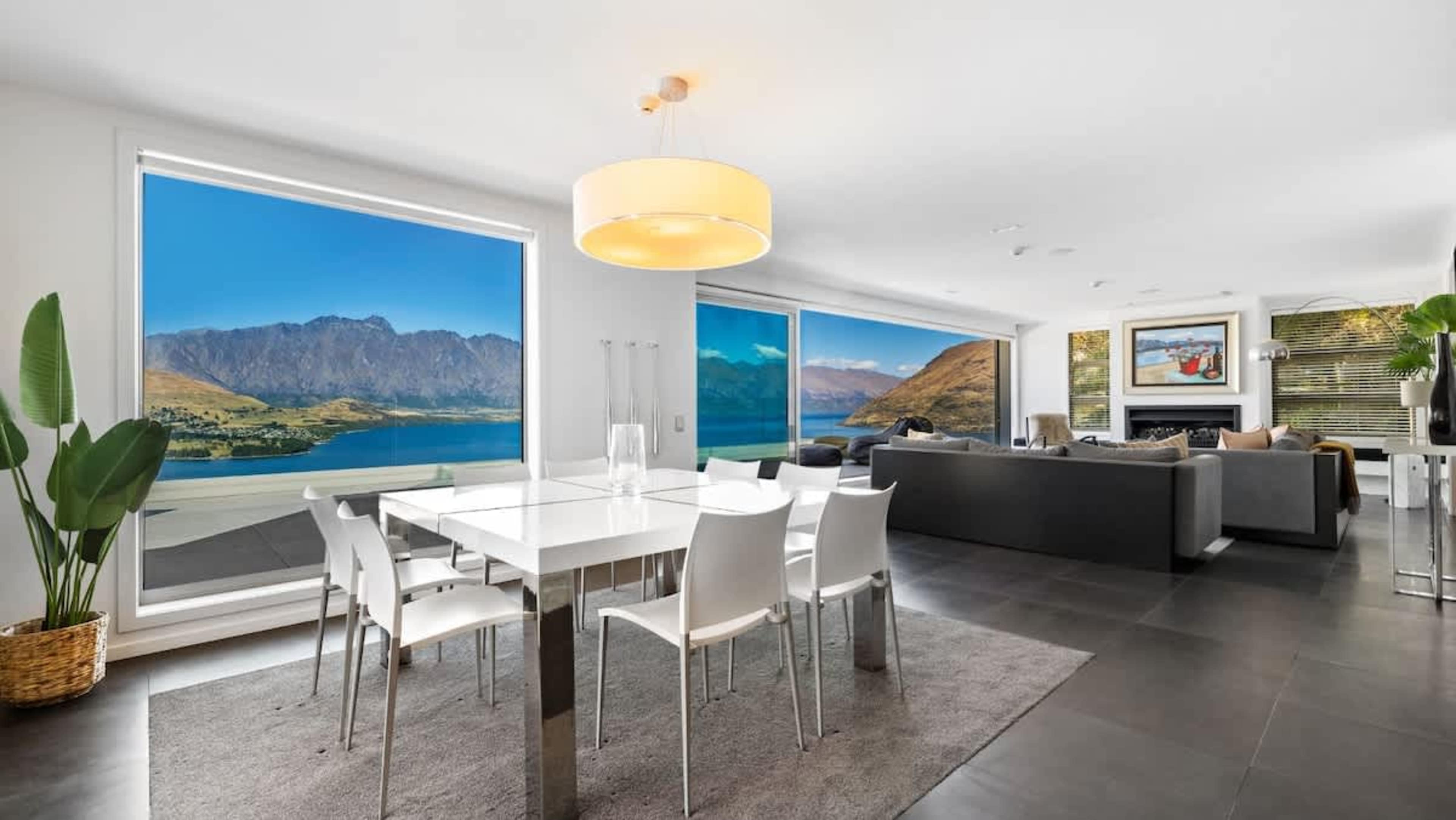 Elegant Dining Area
Gather around the stunning dining table, set against the backdrop of breathtaking lake and mountain views, perfect for family meals or entertaining guests.