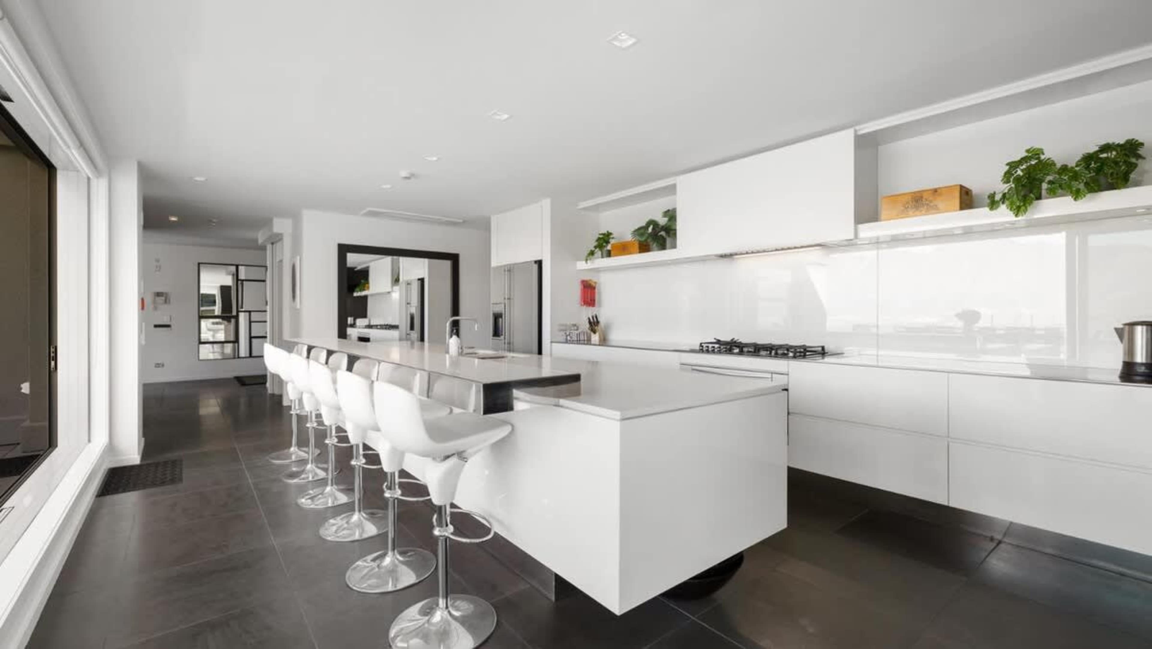 Chef’s Dream Kitchen
Designed for culinary enthusiasts, this modern kitchen offers premium appliances, expansive counter space, and easy flow for effortless entertaining.