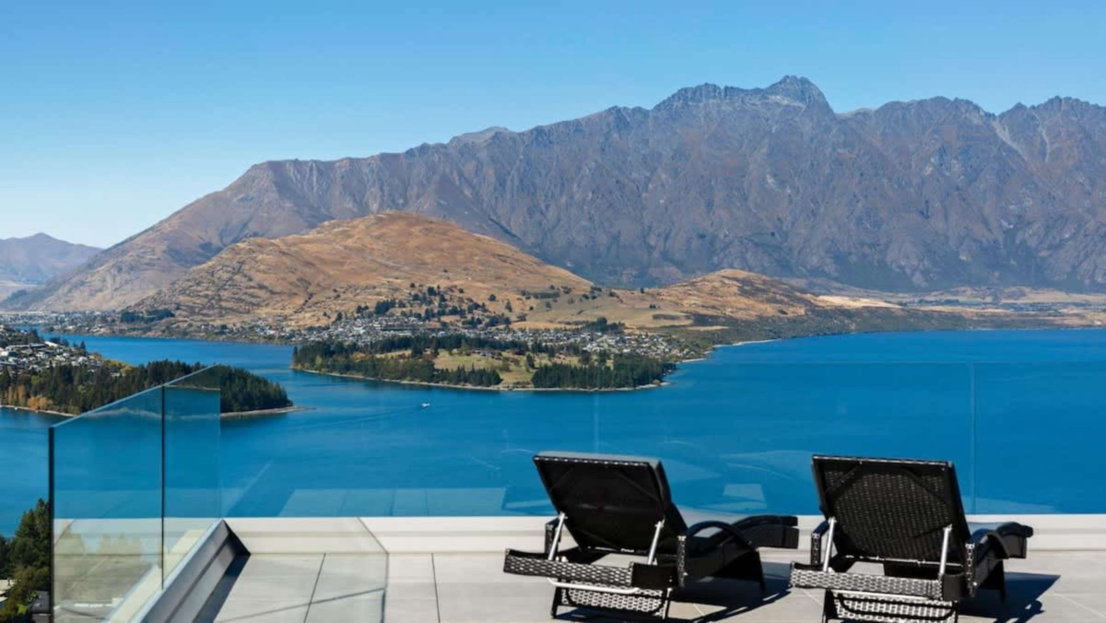 Outdoor Oasis with Hot Tub
Unwind in the private hot tub on the spacious patio, complete with a BBQ and panoramic views of Lake Wakatipu and The Remarkables, creating the ultimate outdoor retreat.