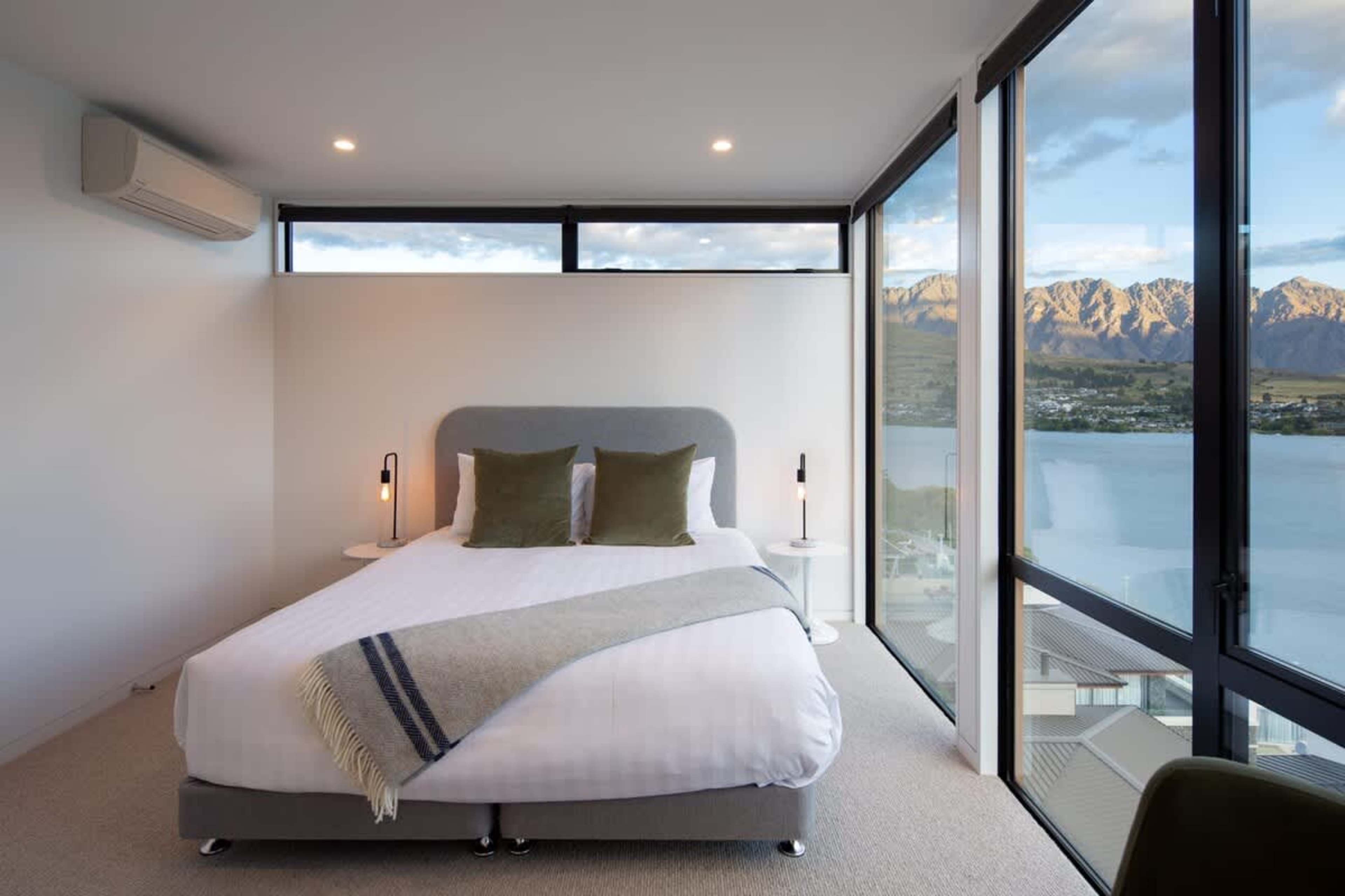 Elegant Second Bedroom with Ensuite and Wardrobe – This serene bedroom features a king bed, private ensuite, and generous wardrobe, providing both comfort and privacy for your stay.