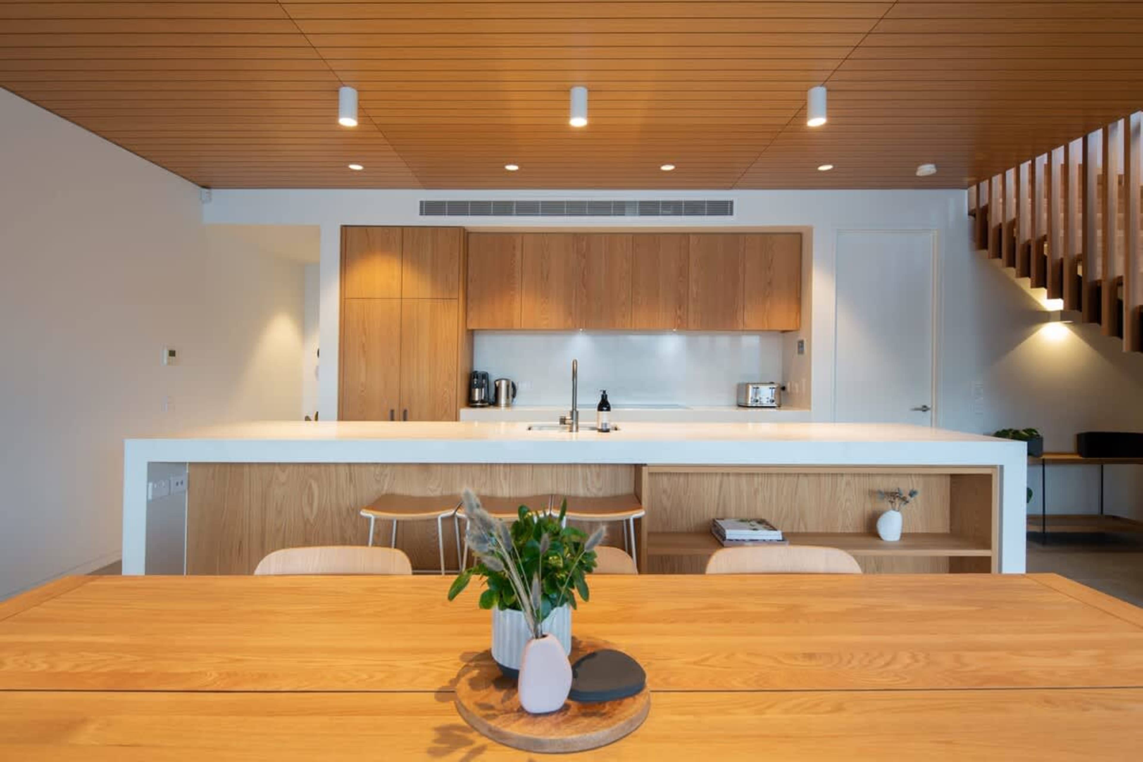 Sleek Kitchen with Coffee Corner – This well-appointed kitchen includes a Nespresso machine, ideal for starting your day with a coffee fix while surrounded by high-end finishes and stunning views.