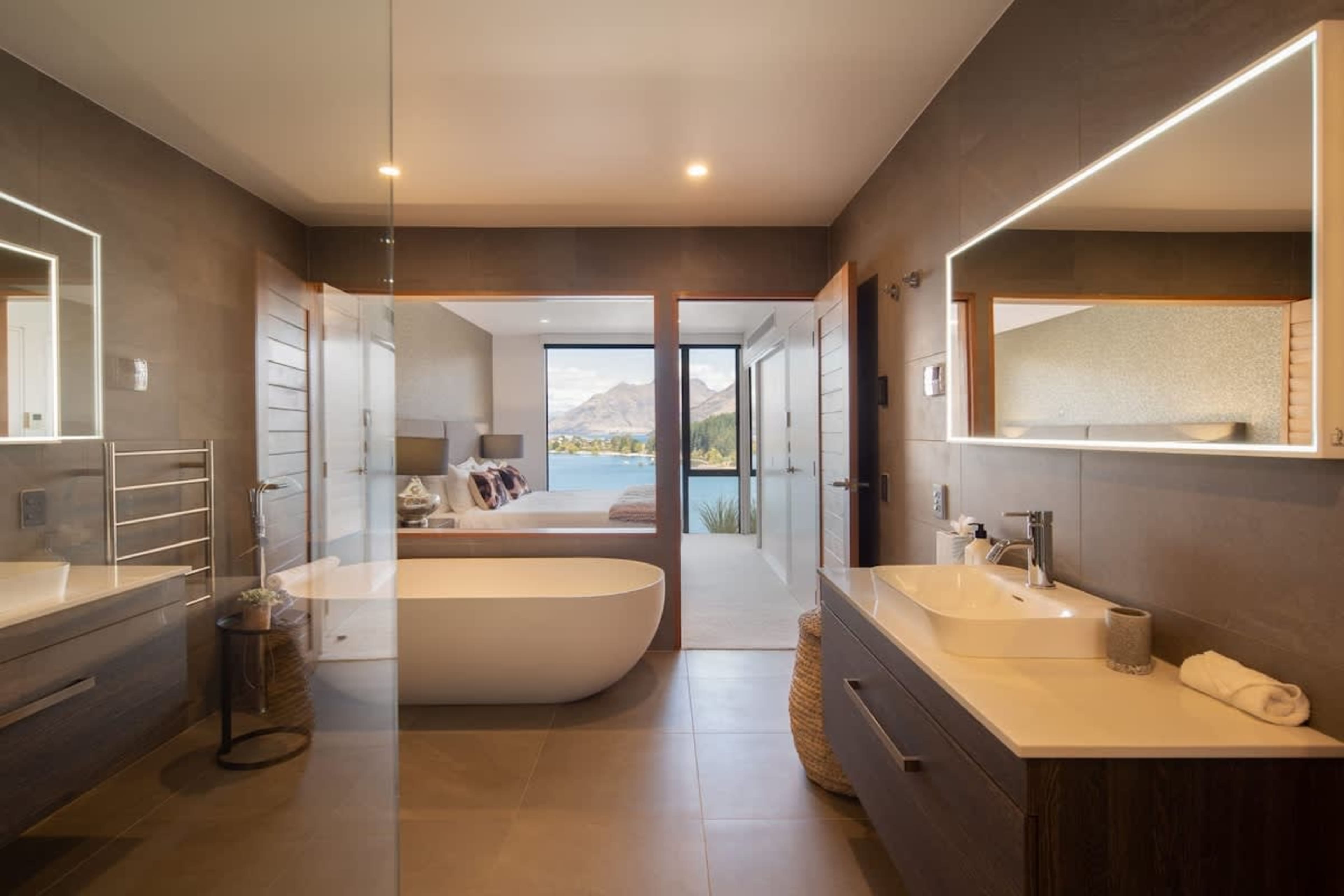 Master Bathroom with Spa Tub and Heated Floors – Indulge in luxury with a spacious spa tub, underfloor heating, and premium Ashley & Co toiletries for the ultimate relaxation experience.