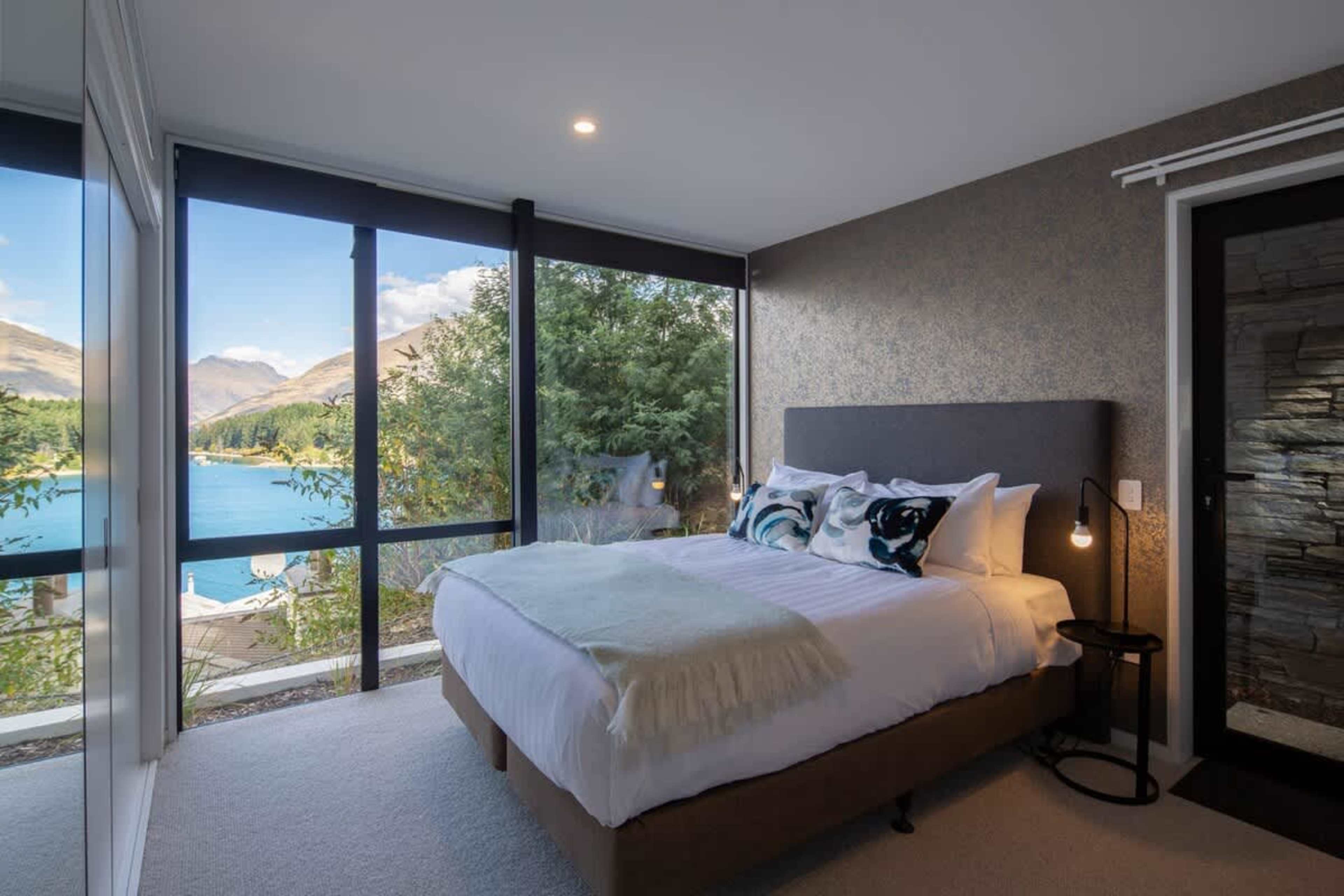 Relaxing Bedroom with Climate Control – Enjoy a peaceful retreat in this charming bedroom with a plush queen bed and air conditioning for the perfect temperature year-round.