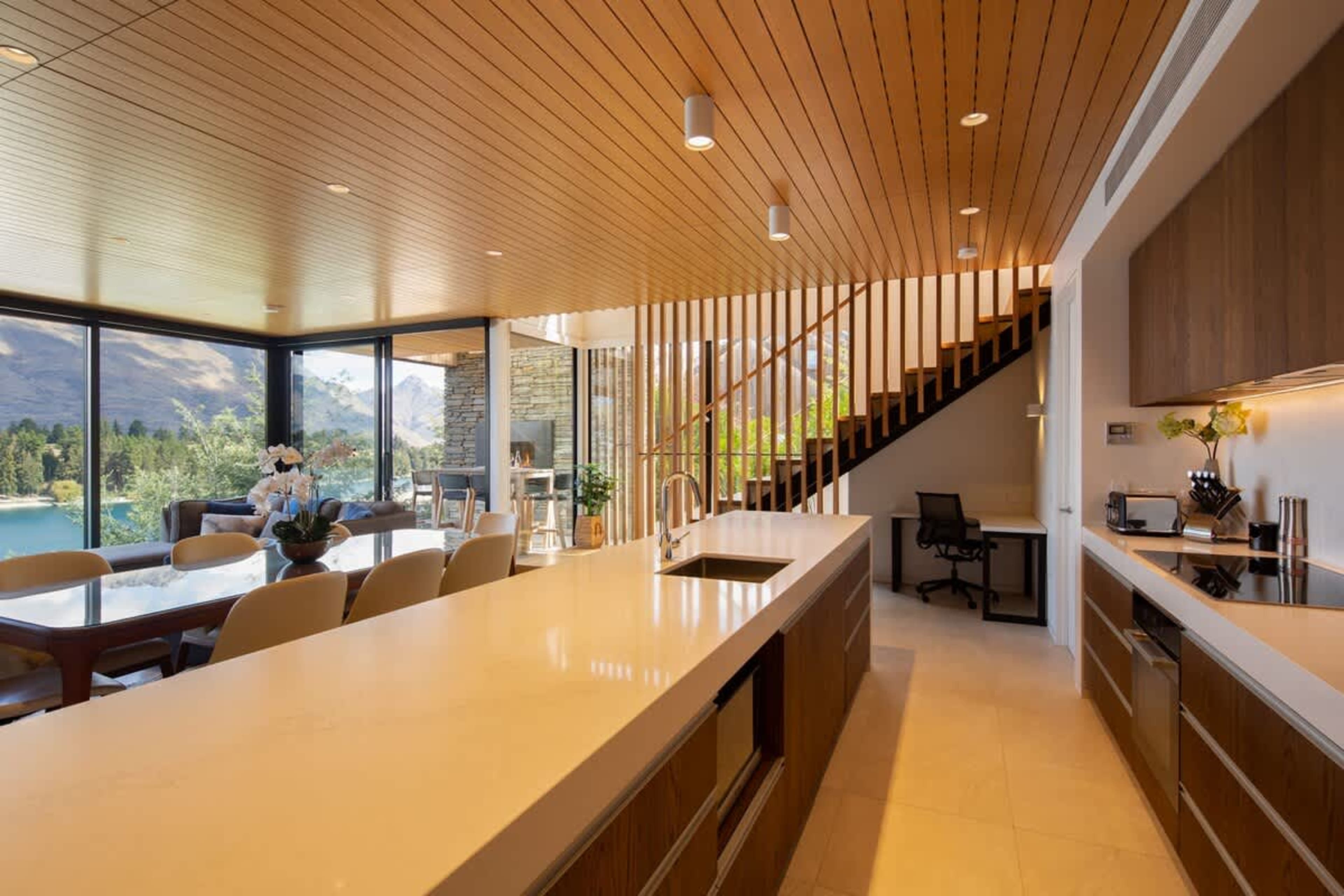 Gourmet Kitchen with Nespresso – This fully equipped kitchen features high-end appliances, ample counter space, and a Nespresso machine, ensuring a perfect start to your day with fresh coffee and luxury surroundings.