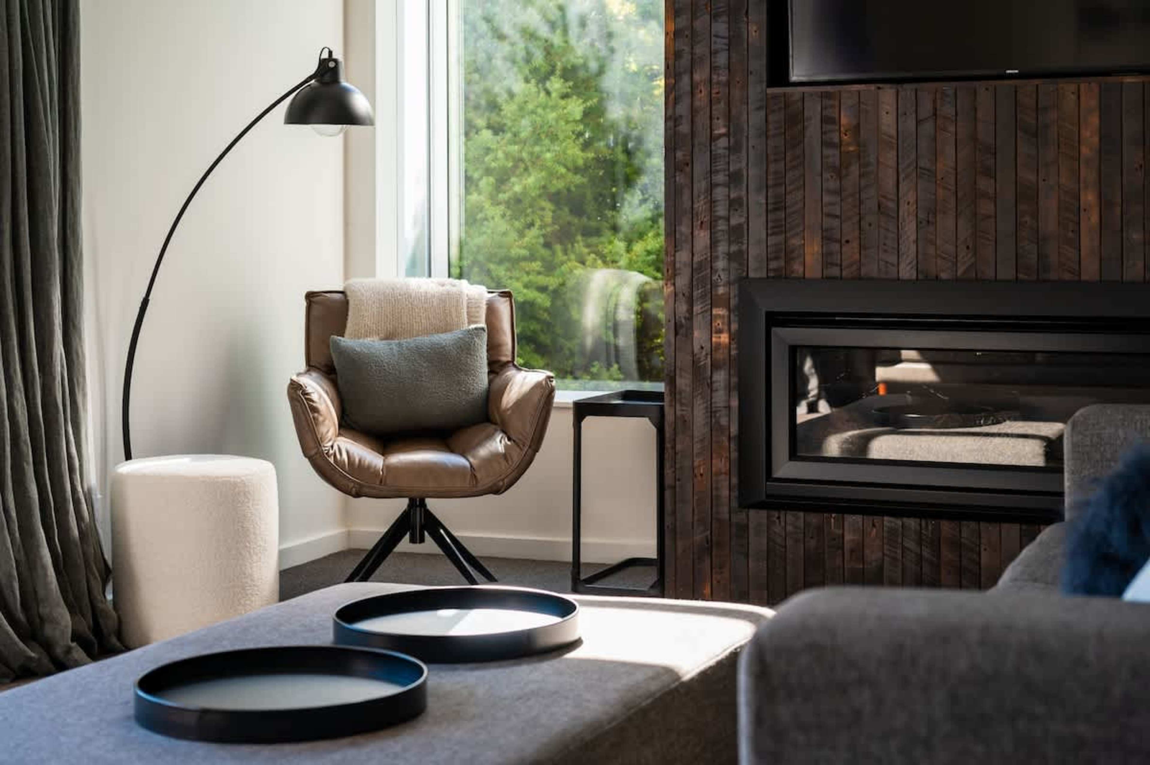 Relax in style with Netflix, WiFi, and unbeatable Queenstown scenery from your sun-soaked living room.