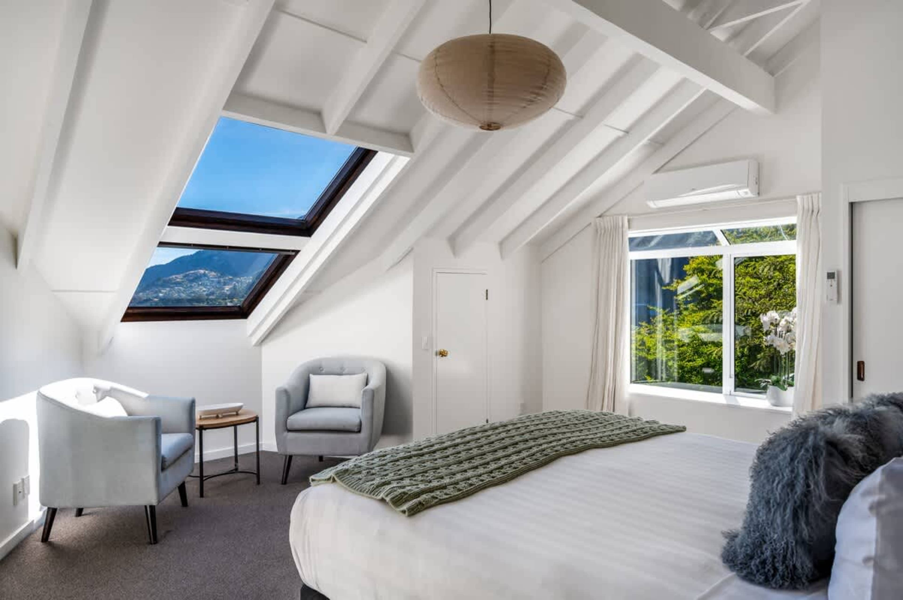 Luxurious master suite with ensuite, brand new Sleepyhead bed, and premium hotel-quality linen—your Queenstown retreat awaits.