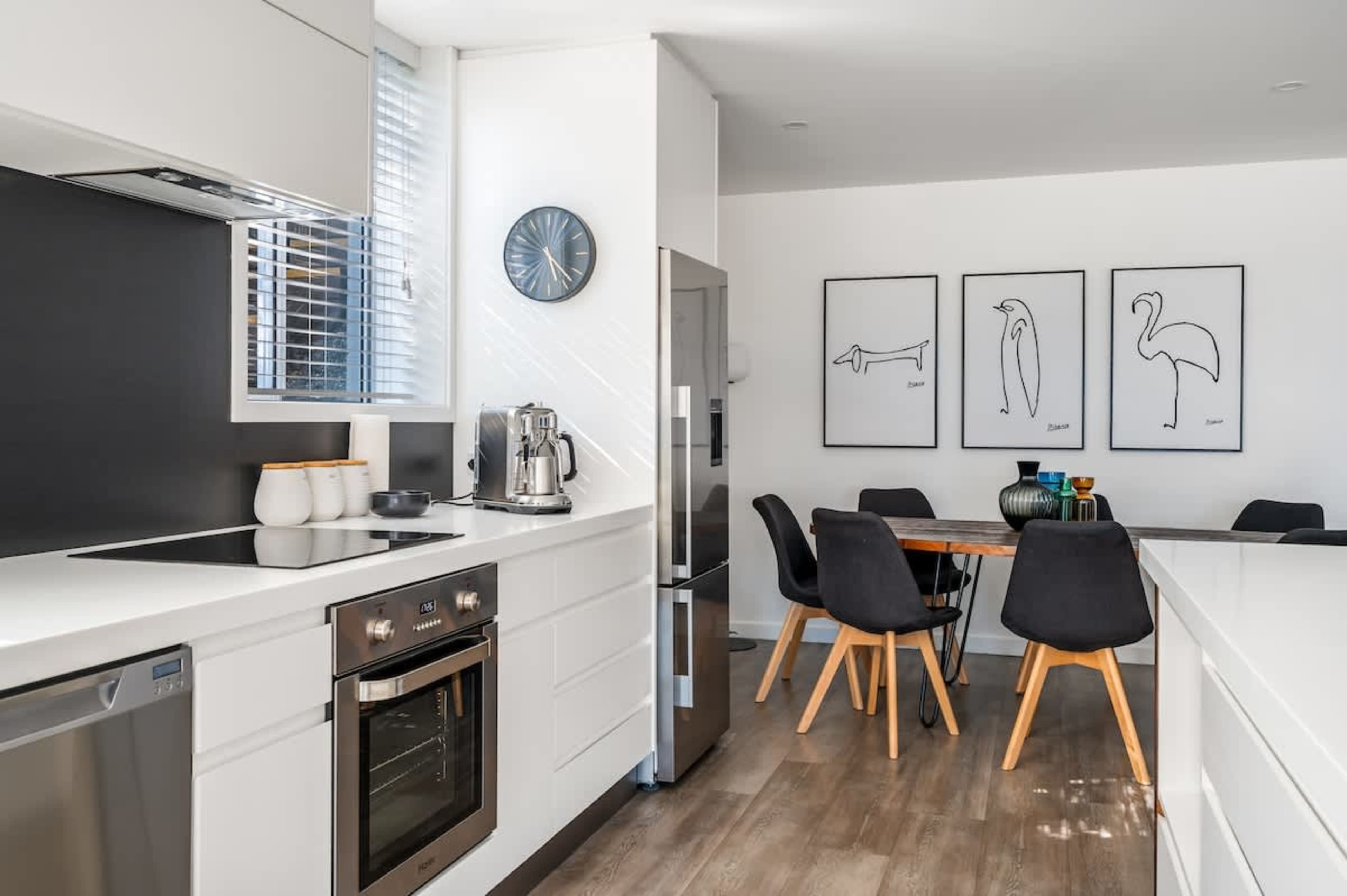 Wake up to fresh coffee and lake views in this modern Queenstown kitchen—perfect for relaxed mornings before exploring.