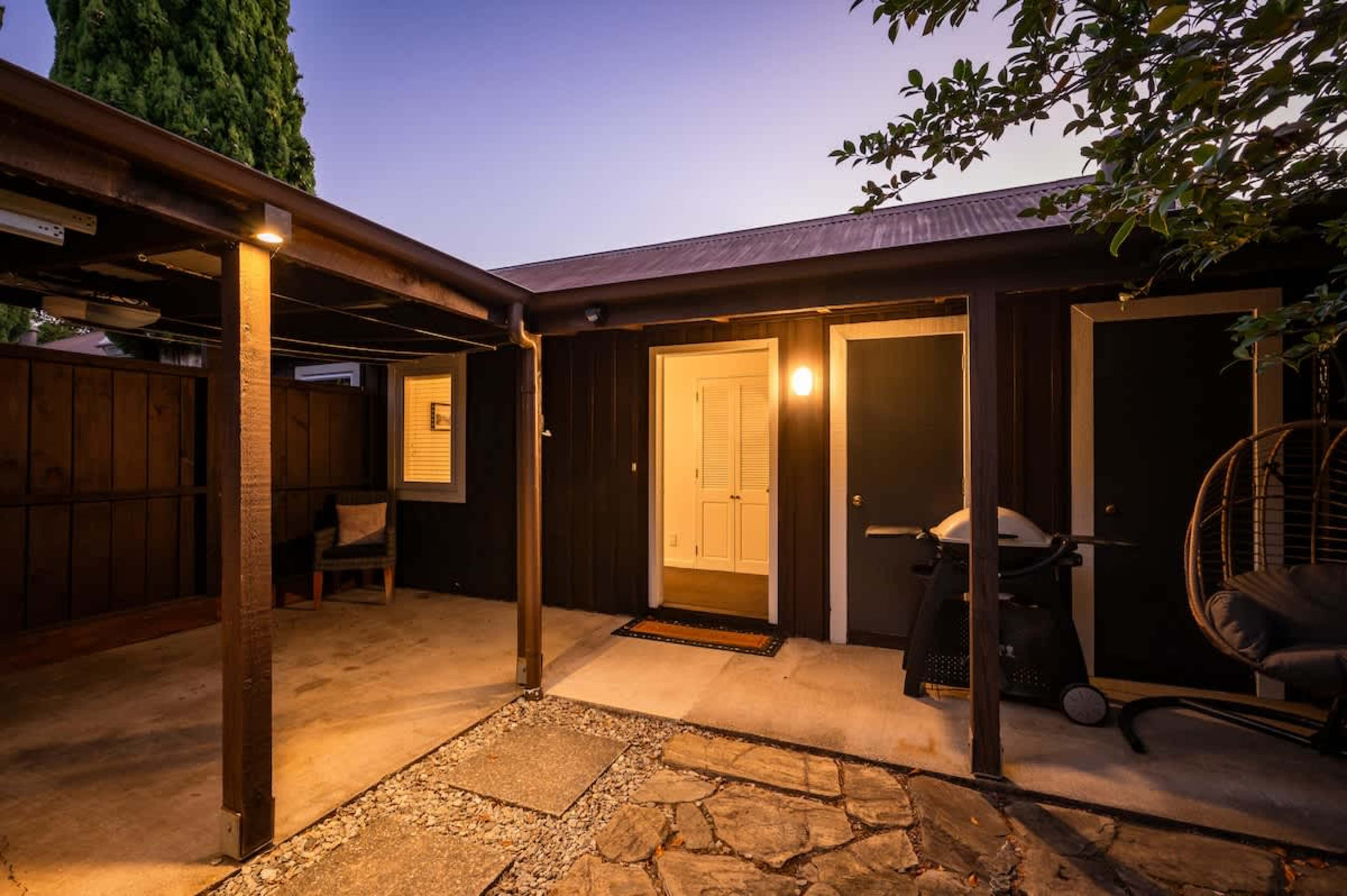 Warm and welcoming entrance, setting the tone for your Queenstown getaway with stylish touches and easy access to all your alpine adventures.