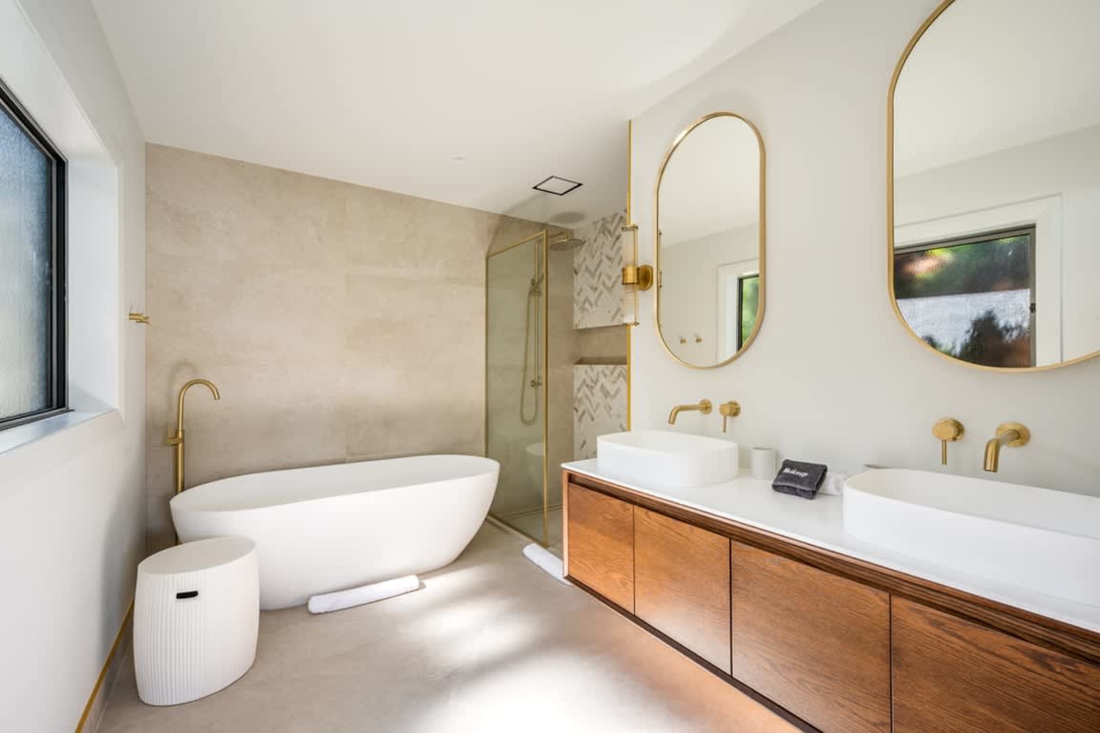 Master Ensuite Luxury Indulge in the spacious master ensuite featuring both a freestanding bath and a walk-in shower, providing the perfect blend of relaxation and luxury.