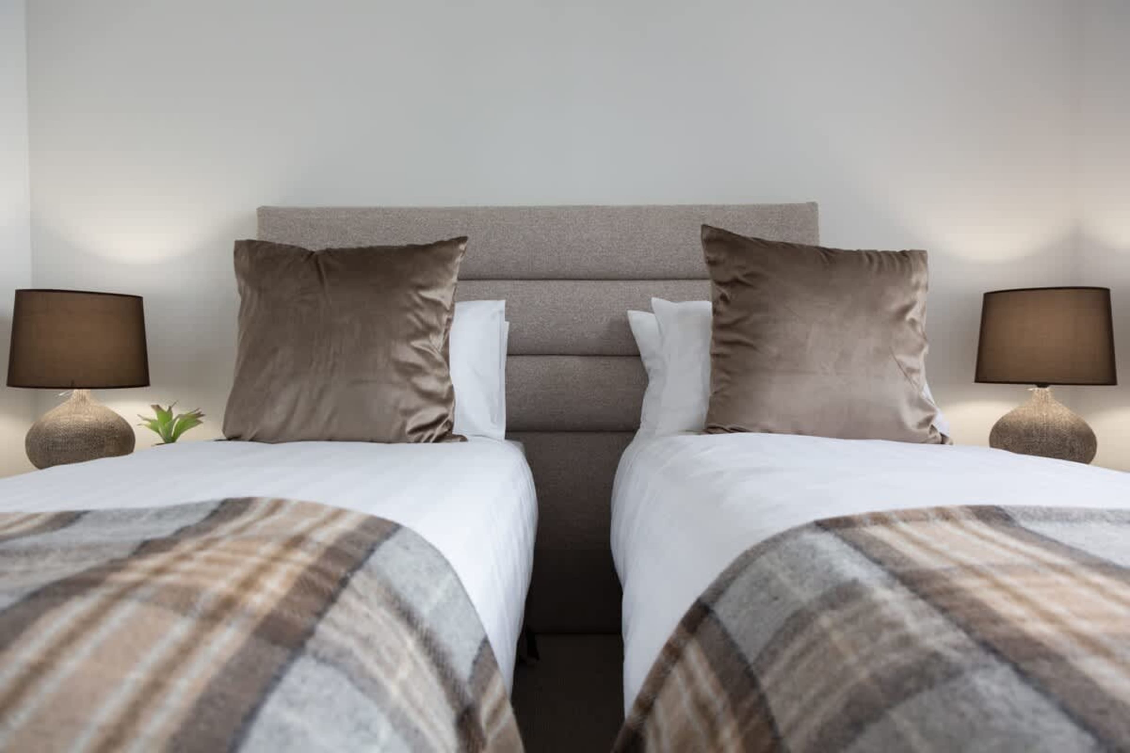 Fourth Bedroom - Spacious and Adaptable
This spacious fourth bedroom features a king split bed, allowing for a customizable sleeping setup to suit your needs.