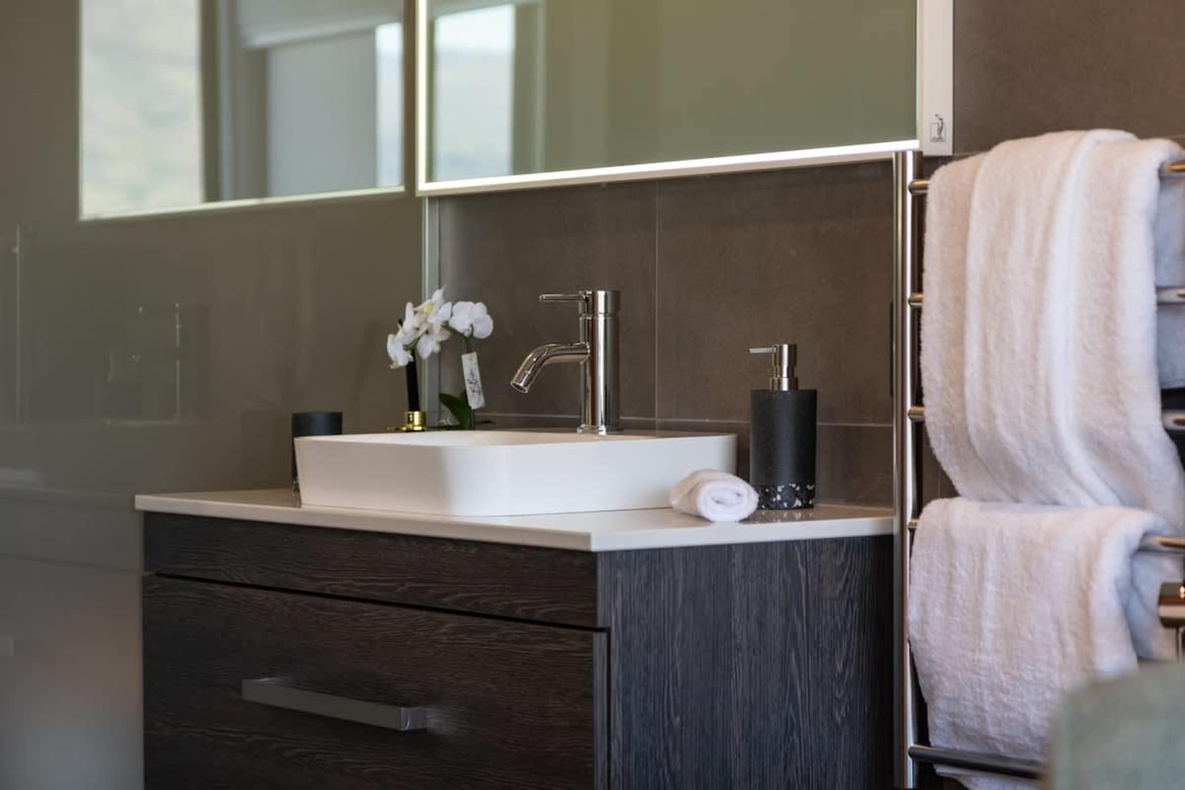Third Bathroom - Sleek and Functional
This well-appointed third bathroom offers a spacious layout, premium fixtures, and a clean, minimalist aesthetic.