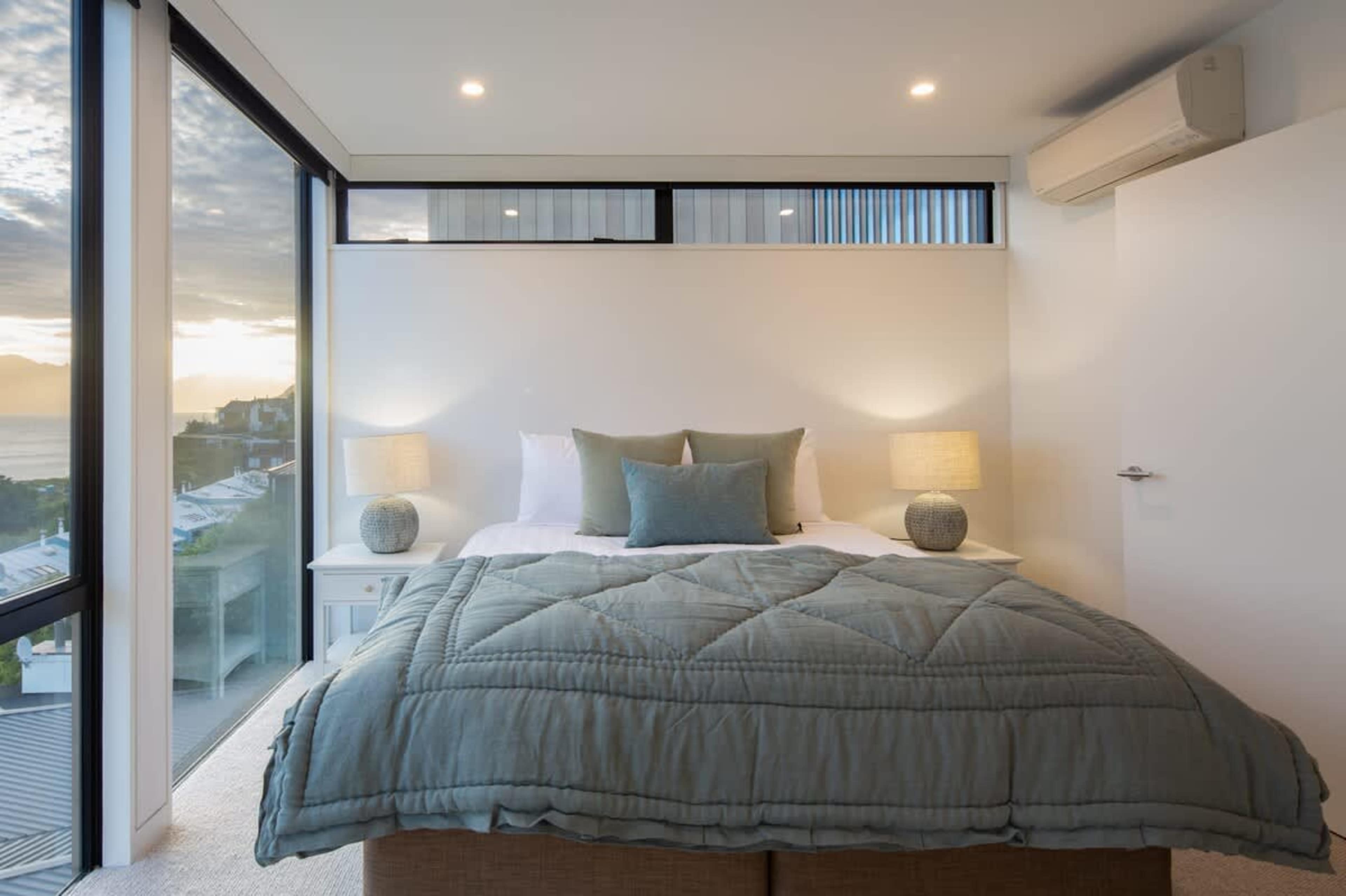 Second Bedroom - Functional and Relaxing with Ensuite
This well-appointed second bedroom offers a peaceful retreat with a comfortable bed, modern furnishings, and a private ensuite for ultimate privacy.