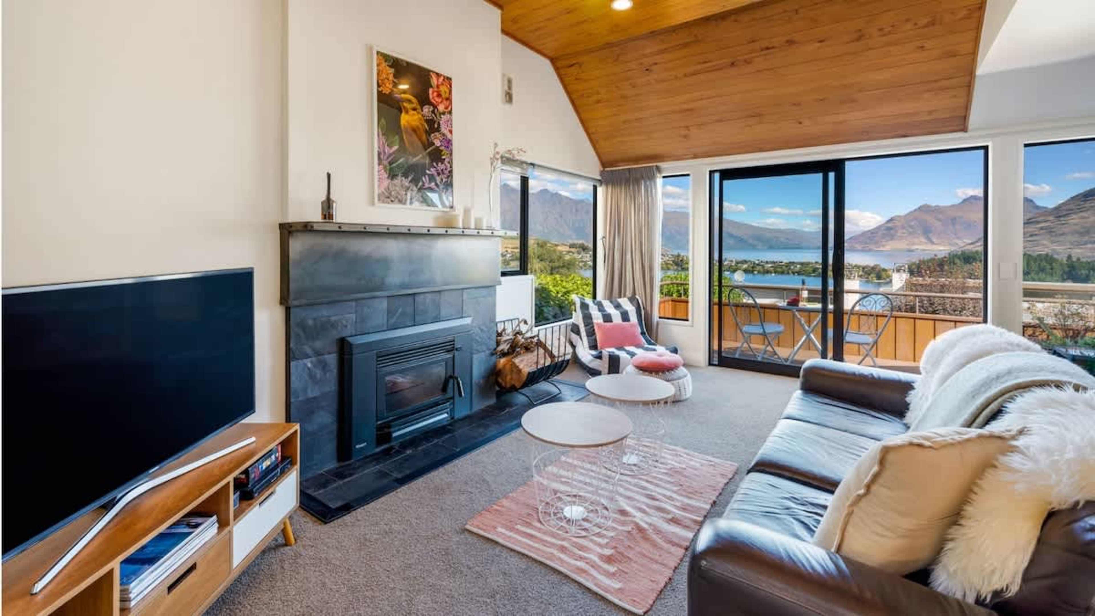 Toasty log fire at our 5-star accommodation, Queenstown