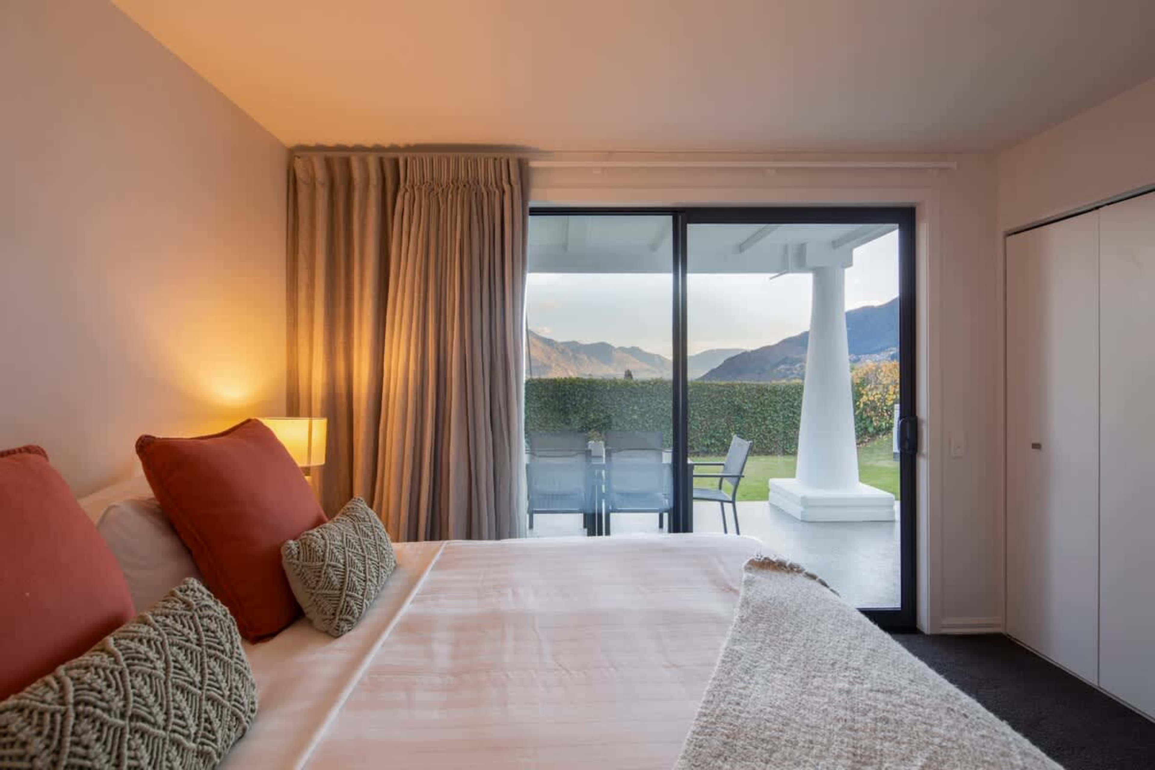 Luxurious Master Retreat ✨

Unwind in the spacious master bedroom, featuring a plush king bed, premium linens, and a private ensuite for ultimate comfort. The perfect sanctuary to relax and recharge after a day of adventure in Queenstown