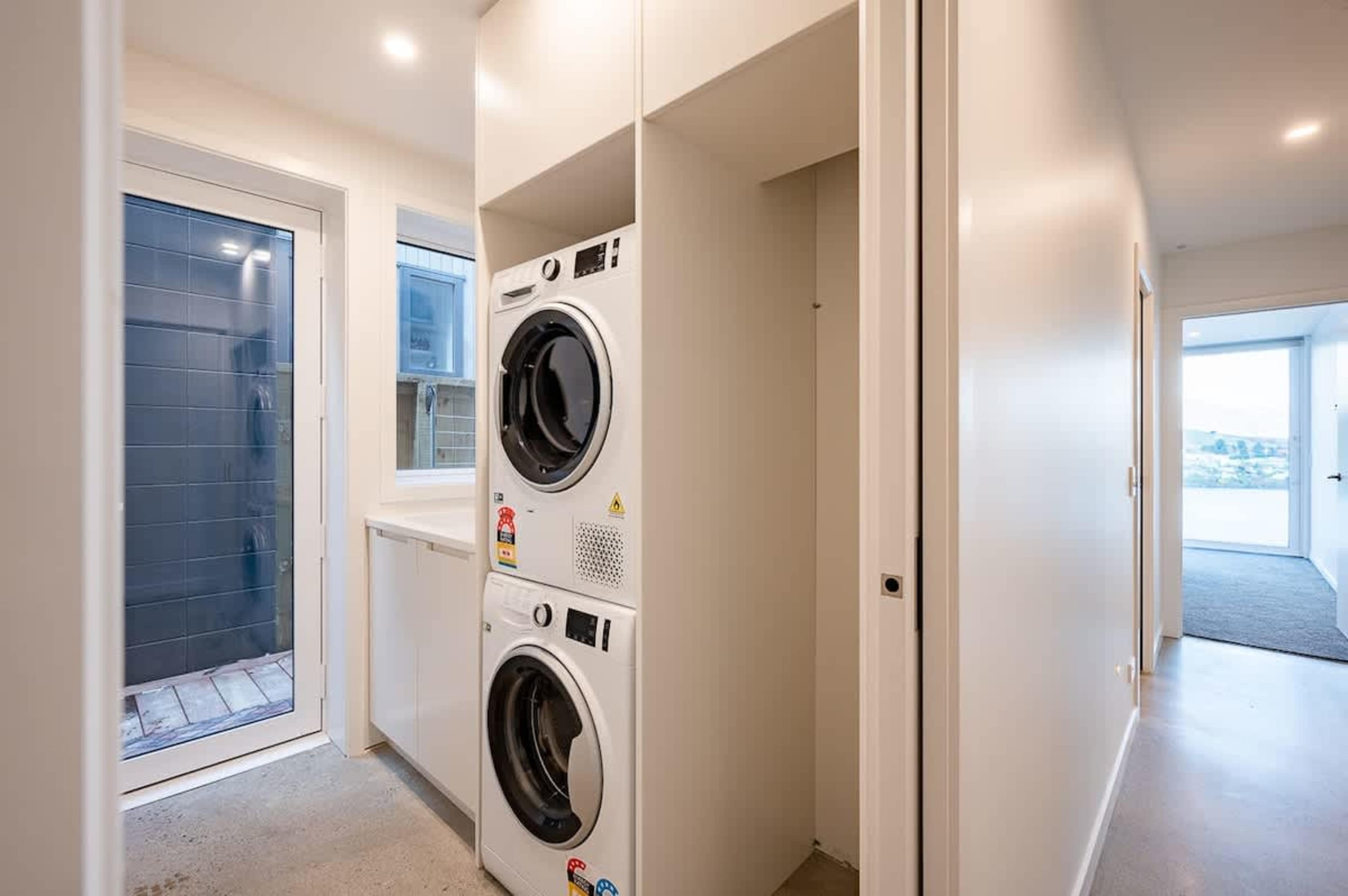Convenient laundry facilities available at the holiday accommodation, NZ