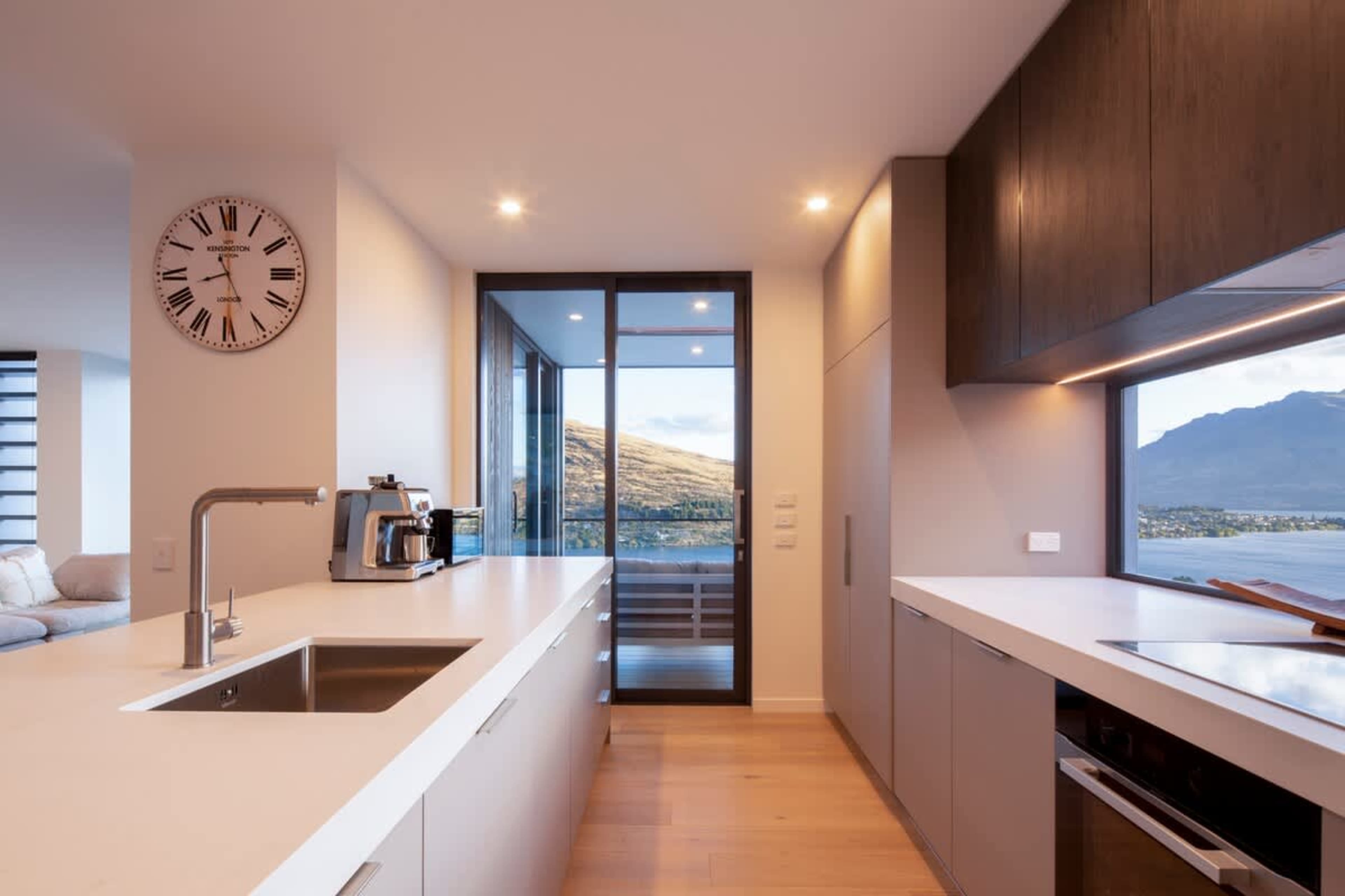 This spacious kitchen boasts top-of-the-line appliances, a large island for meal prep, and plenty of storage, creating the perfect space for culinary creativity.