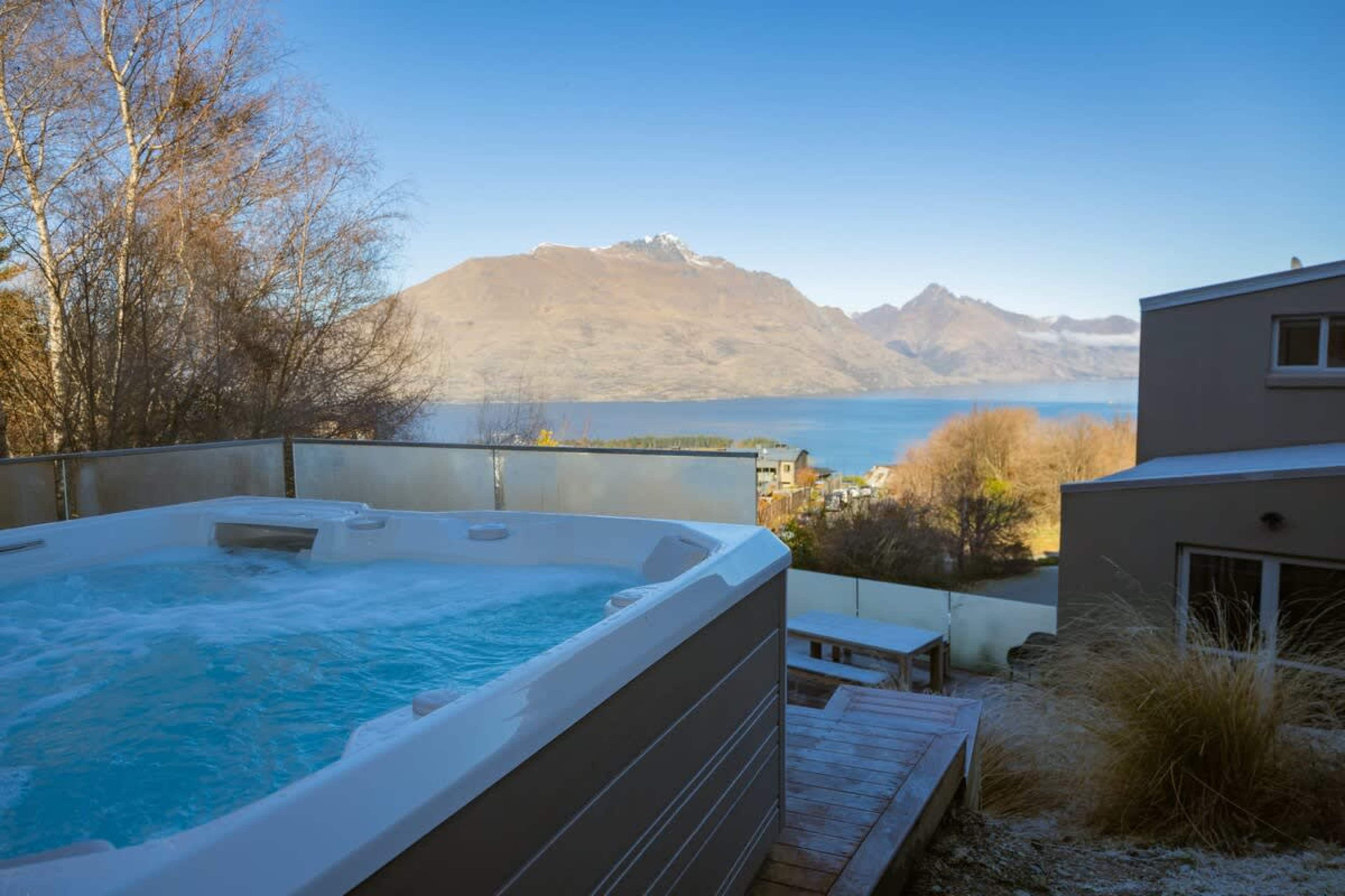 Hot Tub with Stunning Views
Relax in the hot tub, where you can unwind while enjoying breathtaking views of the lake and mountains, creating the perfect spot for relaxation after a day of exploring.