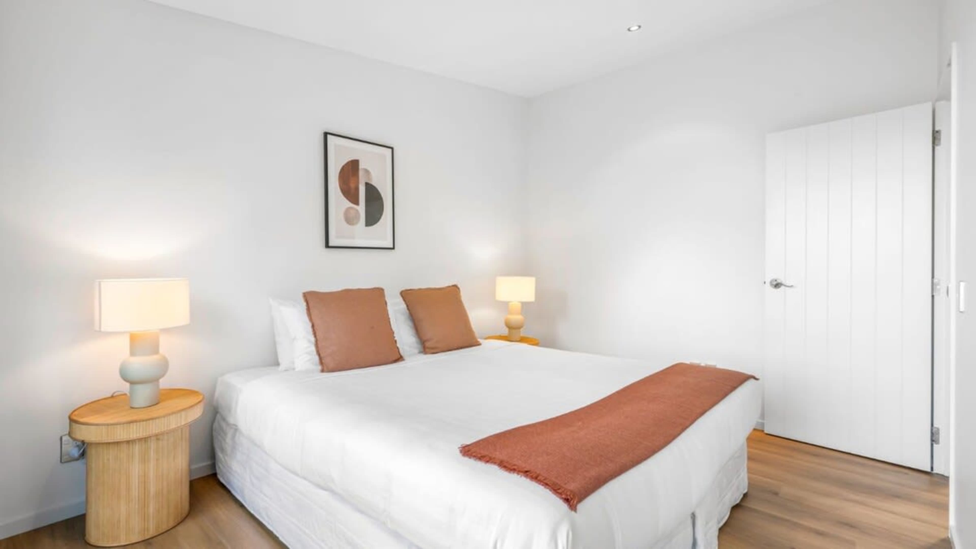 Luxurious Master Suite
Wake up to stunning lake and mountain views from the comfort of the master bedroom, featuring elegant decor and a peaceful ambiance for a restful stay.