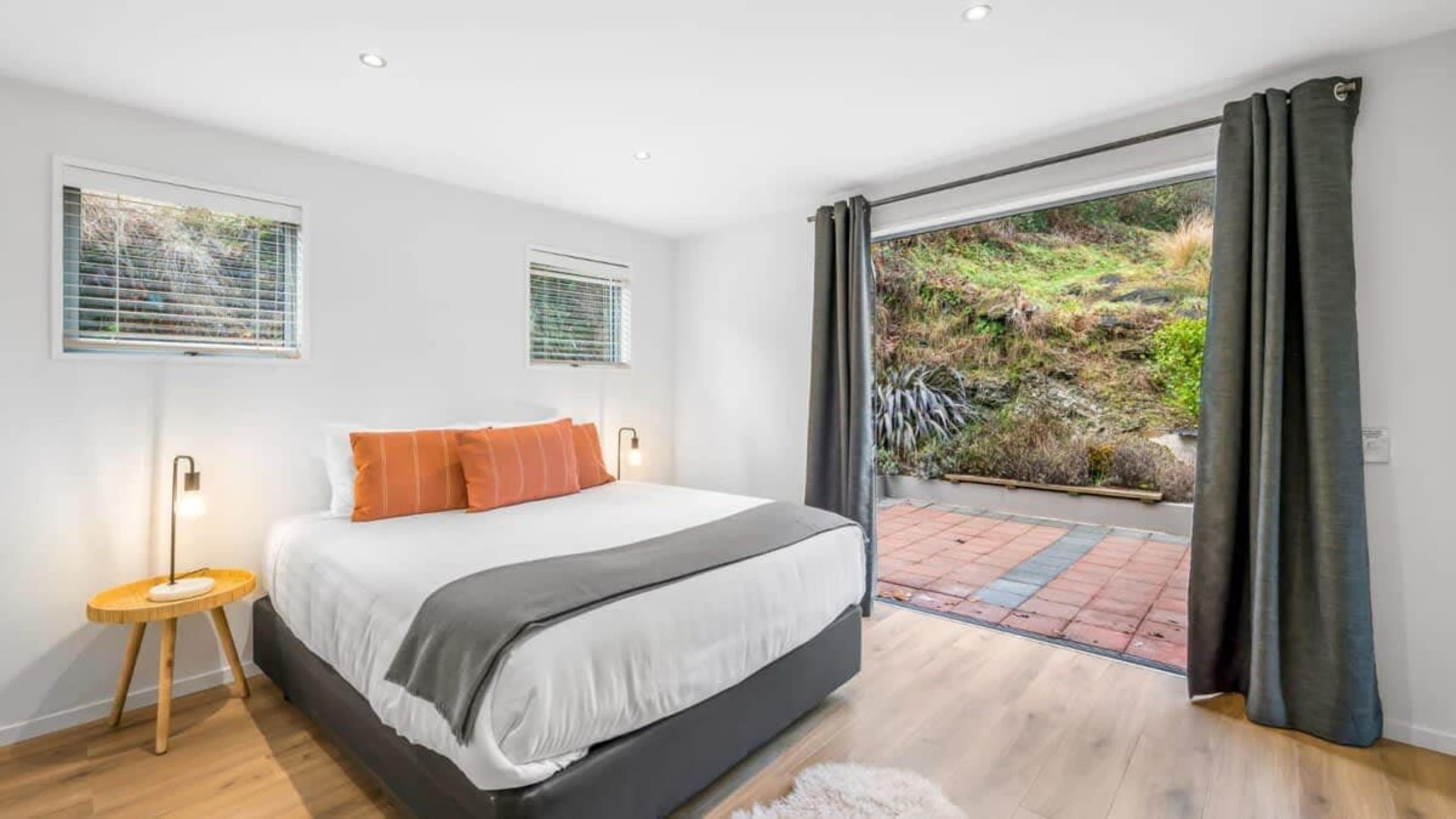Private Bedroom with Ensuite and Patio
Relax in the third bedroom, featuring a private ensuite and direct access to a tranquil outdoor patio, offering a perfect blend of comfort and outdoor living.