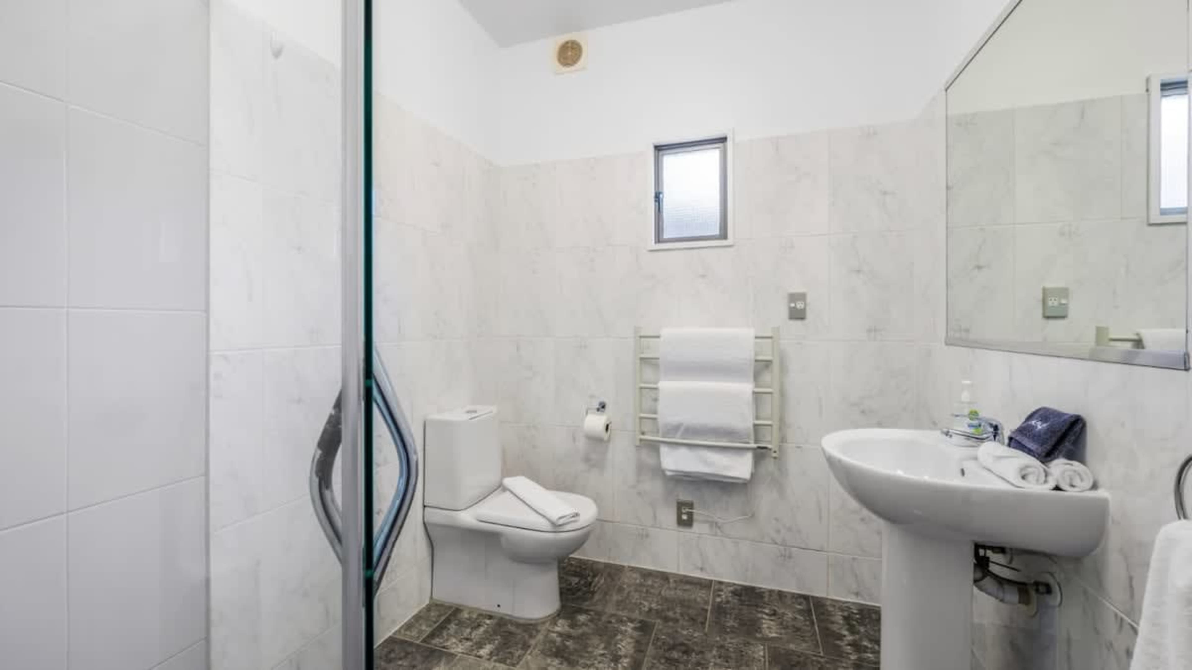 
Shared Bathroom with Ashley & Co Amenities
Enjoy the shared bathroom, complete with high-quality Ashley & Co toiletries, adding a touch of luxury to your stay with soft scents and pampering essentials for a refreshing experience.