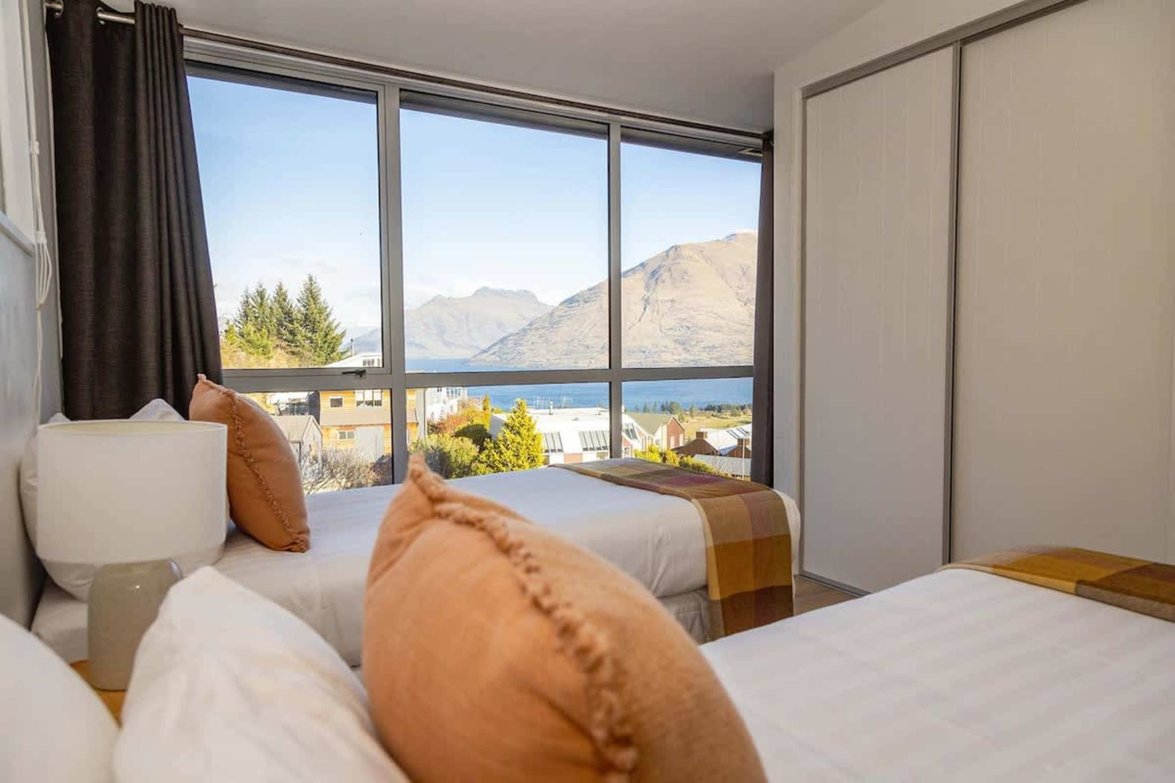 Versatile Second Bedroom with Views
Relax in the second bedroom, featuring a king-split bed for flexible sleeping arrangements and stunning views, creating a peaceful retreat in a serene setting.