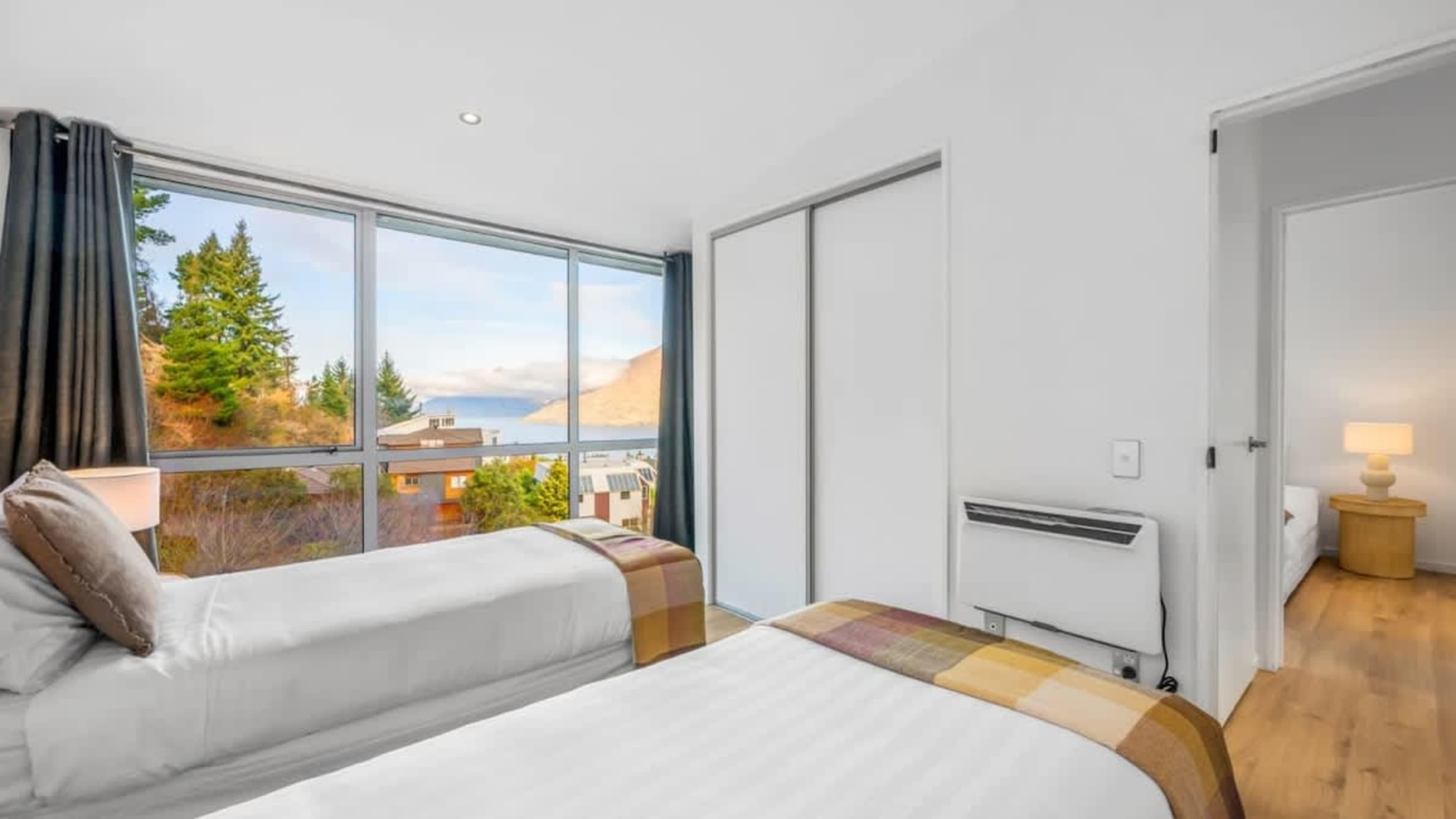 Comfortable King-Split Bedroom with Scenic Views
Unwind in the second bedroom, offering a king-split bed for customizable comfort and beautiful views, providing a restful space with a tranquil ambiance.