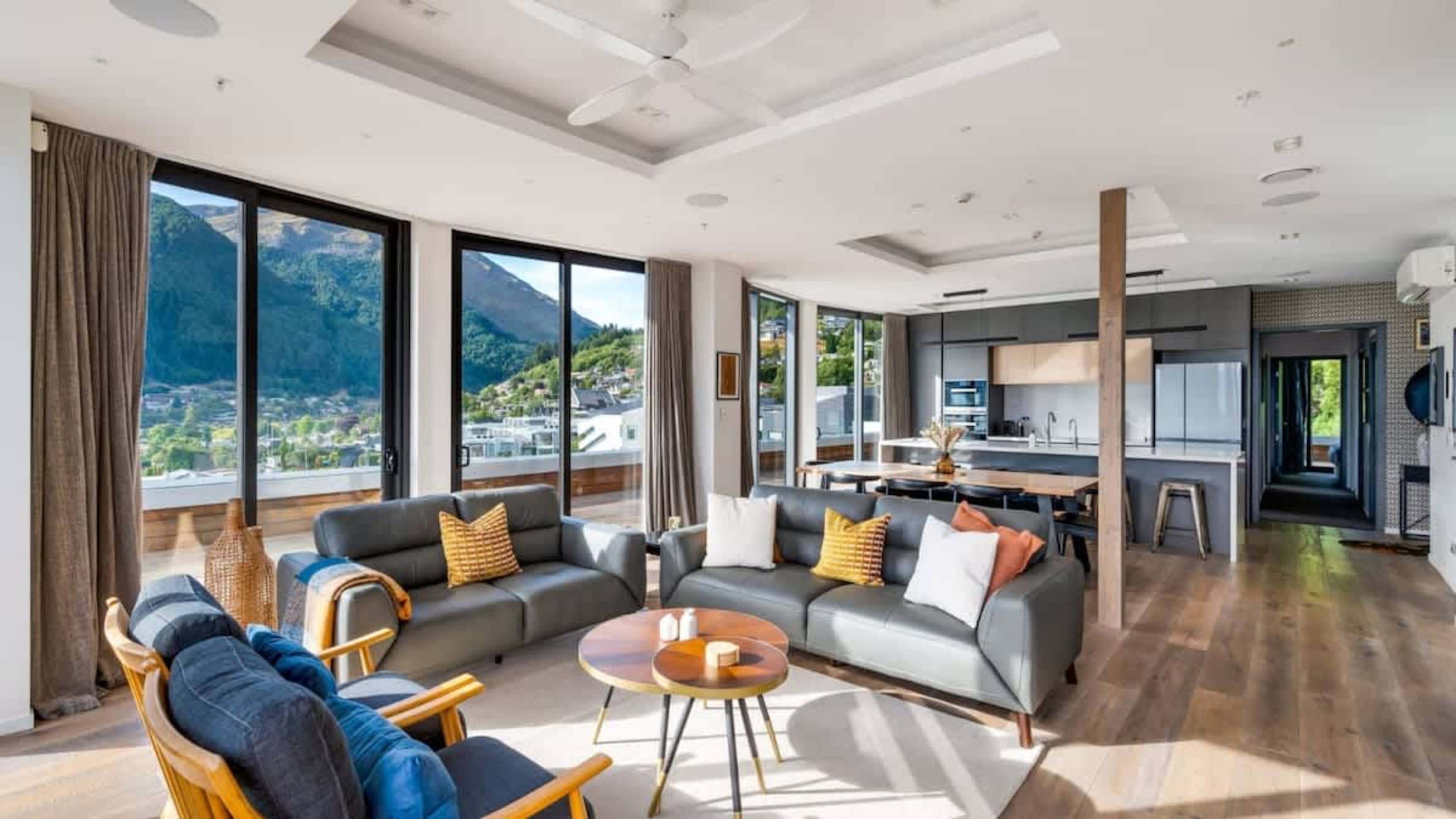 Refined Living Room with Gas Fire and AC
Make yourself at home in the newly furnished living room, offering a gas fire, AC, and a seamless flow to the massive decks with incredible views.