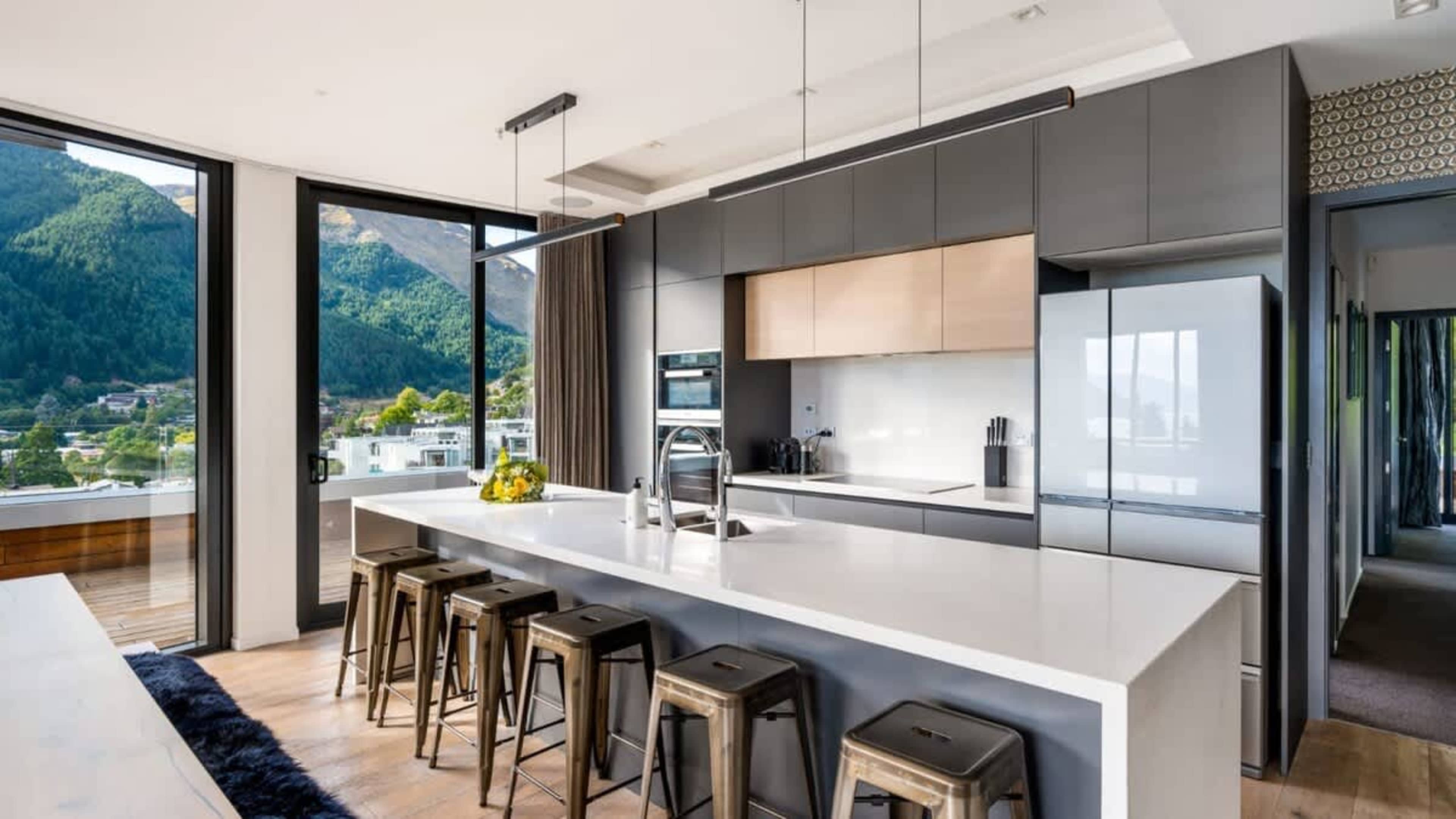 Spacious Kitchen with Views
Create culinary delights in the expansive kitchen, offering quality appliances, a sleek layout, and stunning views to make cooking a pleasure.
