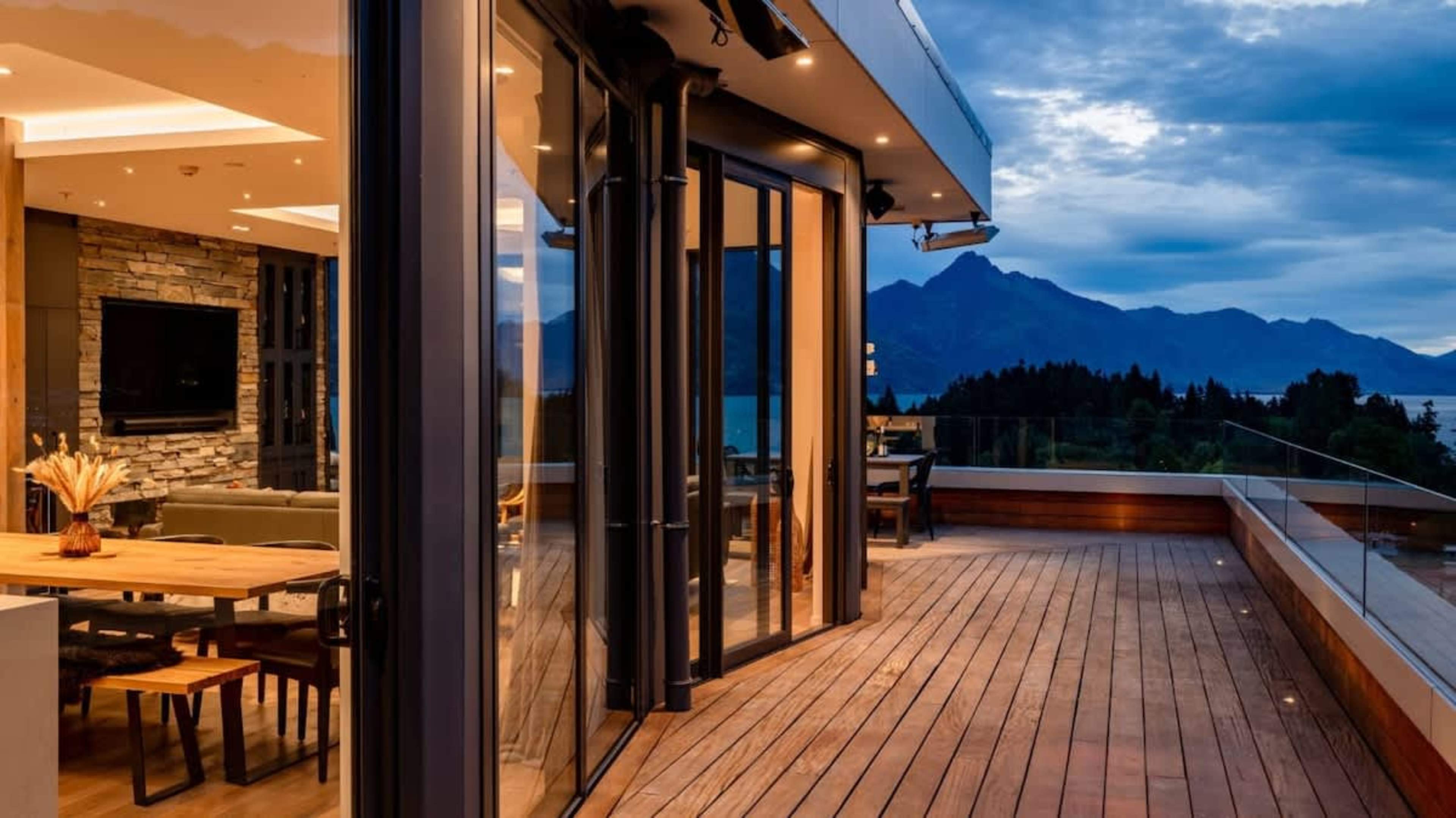 Scenic Balcony with BBQ, Views, and Relaxation
Sit back and relax on the balcony, featuring a BBQ and sweeping views of Queenstown CBD, the lake, and surrounding mountains, perfect for outdoor leisure.