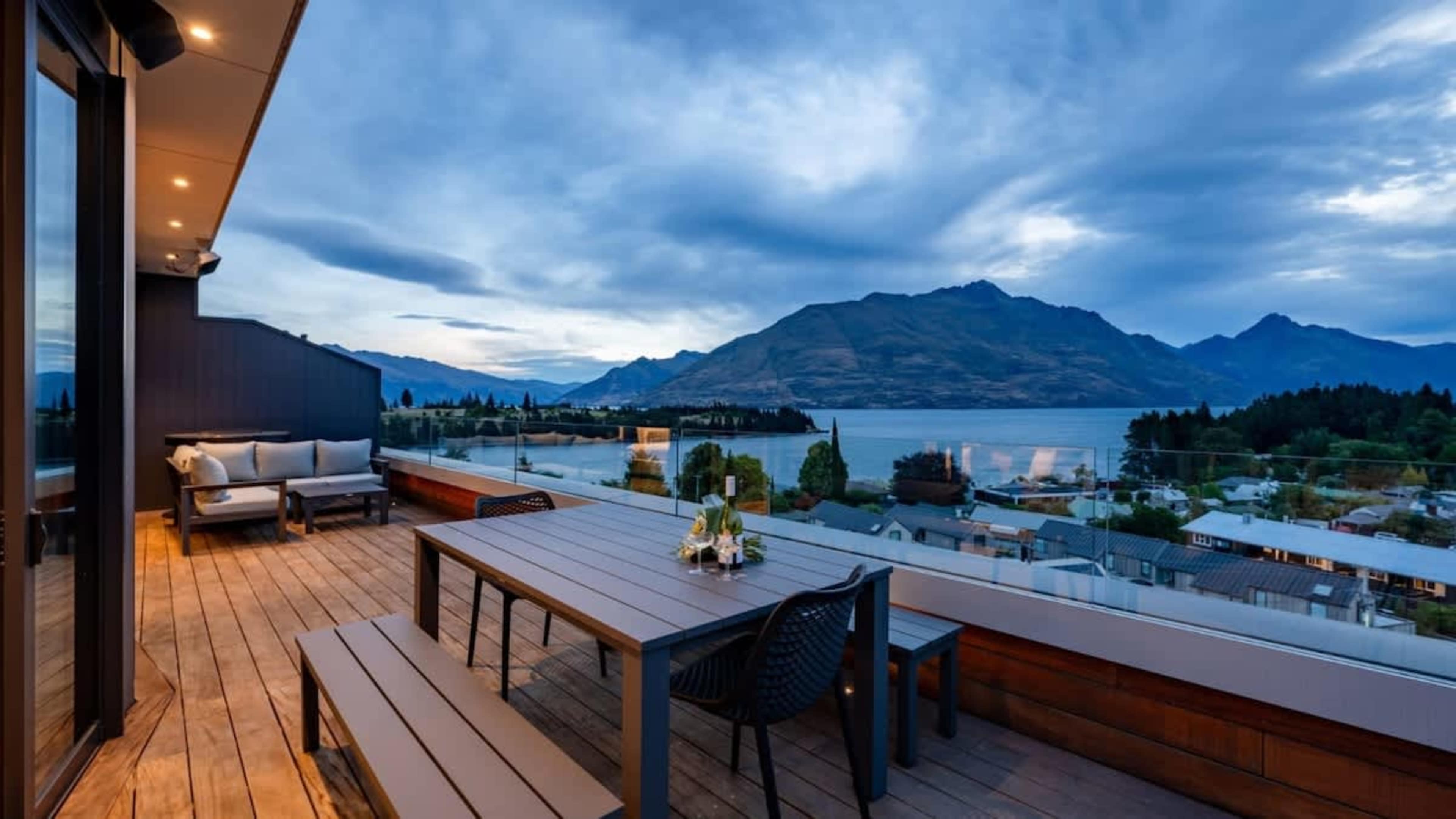 Balcony with Breathtaking Views
Relax on the spacious balcony, offering stunning views over Queenstown CBD, the lake, and surrounding mountains, complete with a BBQ for outdoor dining.