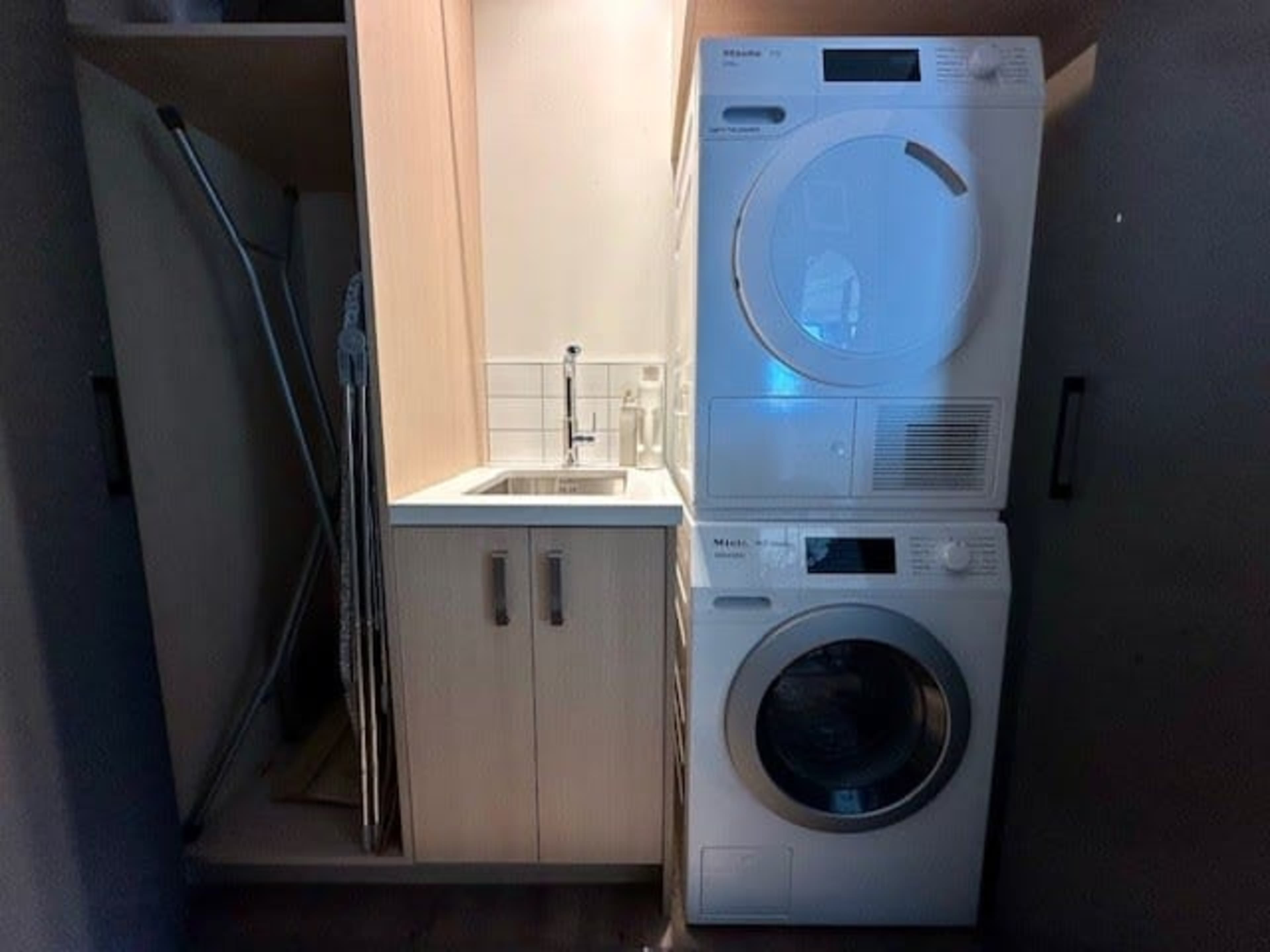 Convenient Laundry Facilities
Enjoy the convenience of an in-home laundry, fully equipped with modern appliances, including a washing machine and dryer, making your stay hassle-free.