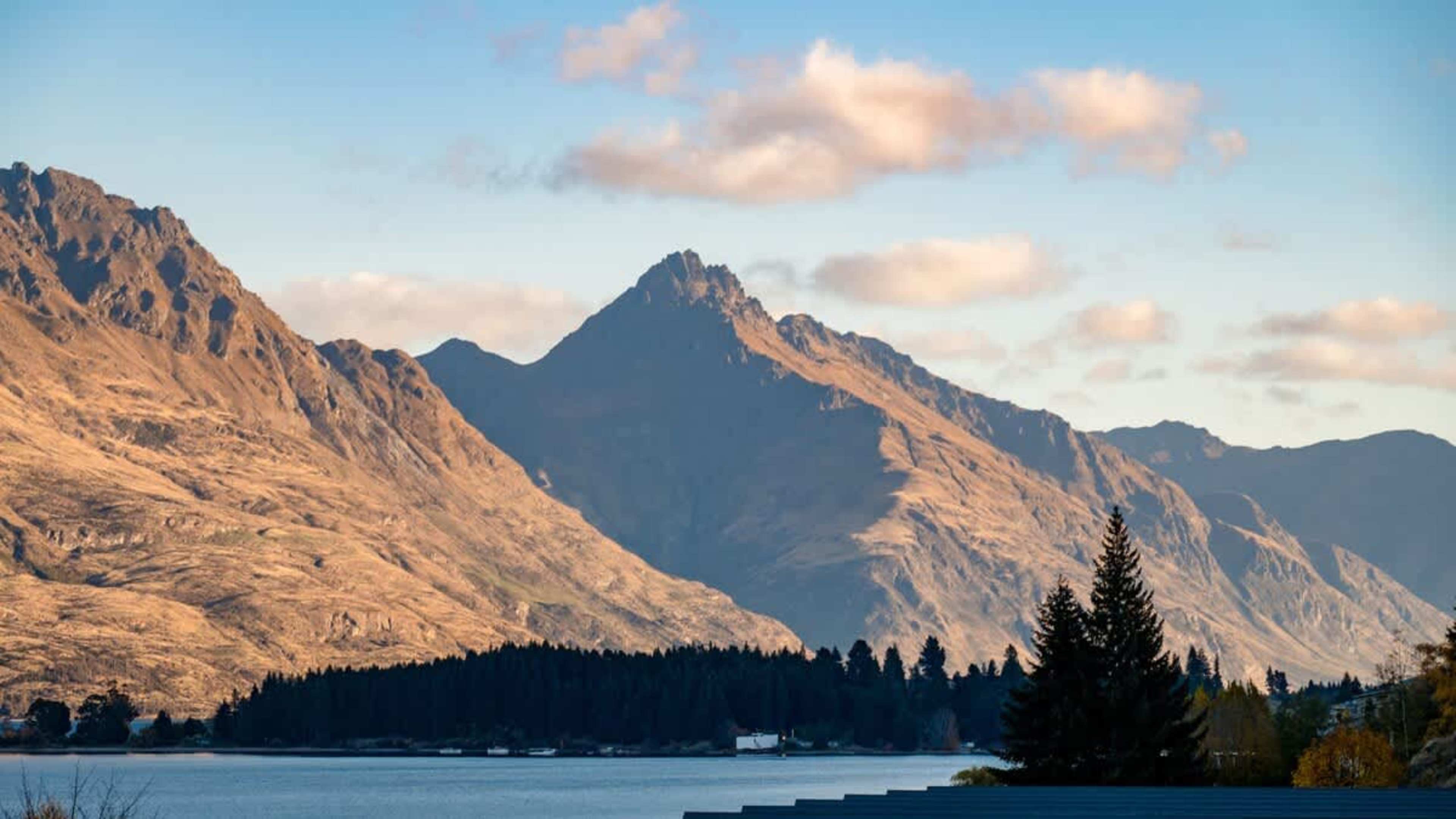 This private balcony boasts spectacular views of the lake and Remarkables mountain range, with comfortable seating for you to take in the natural beauty.