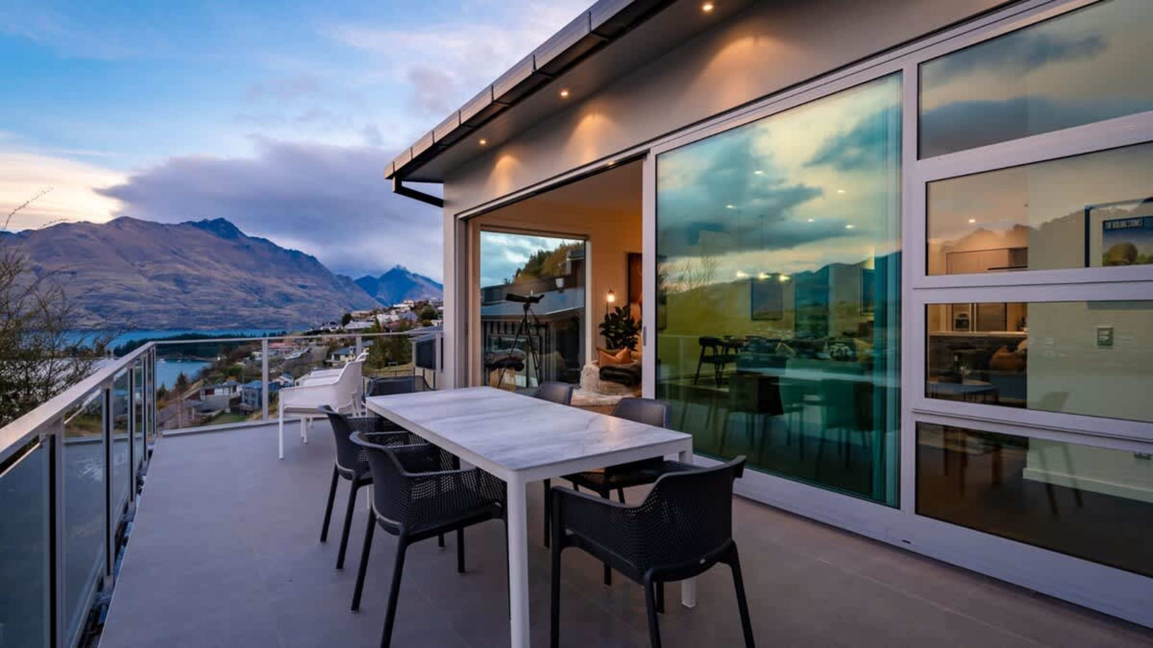 Balcony with Incredible Views, BBQ, and Refreshments
Take in panoramic views from the balcony, complete with a BBQ for outdoor meals, and a cozy space perfect for savoring coffee or wine.