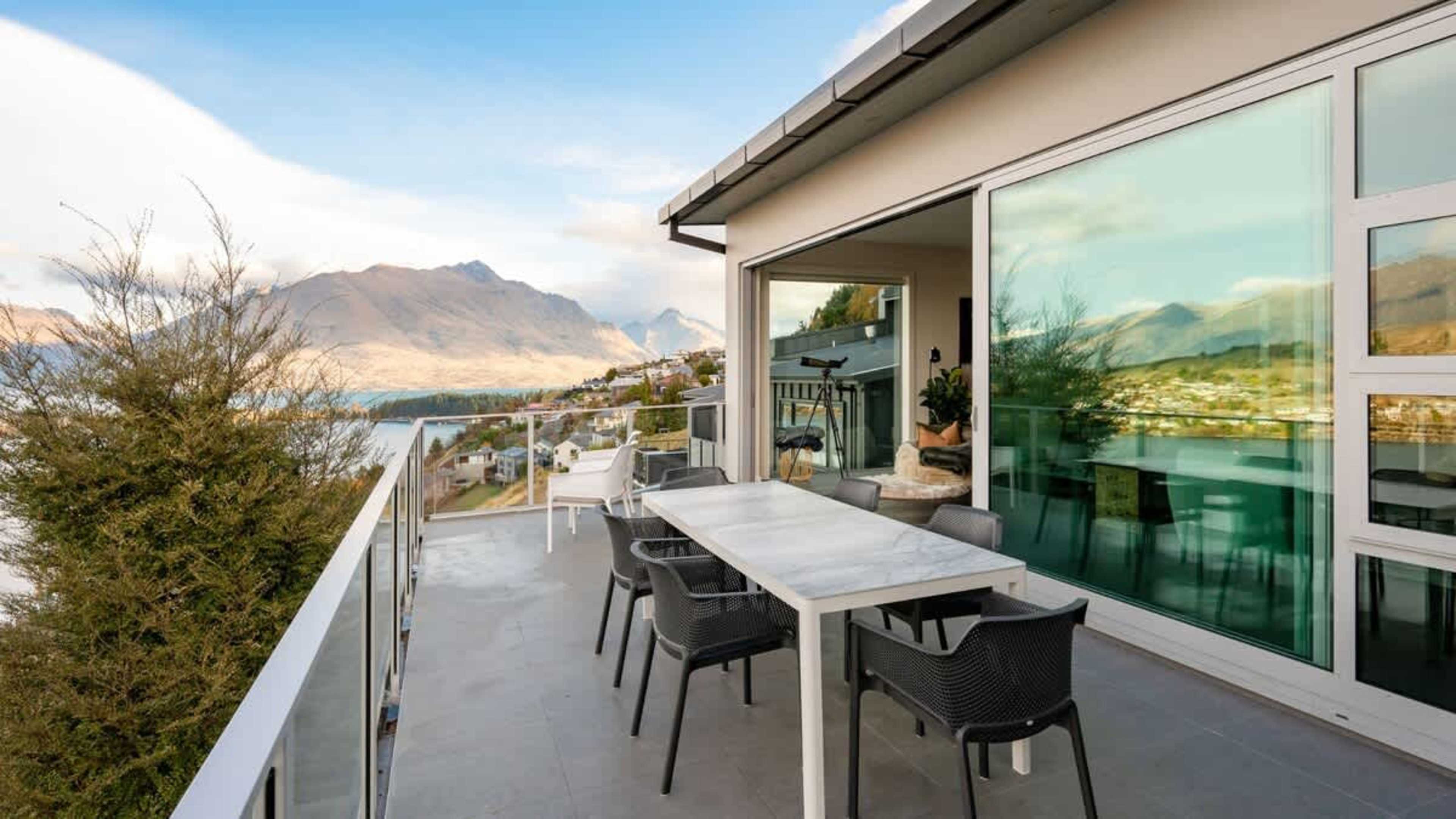 Expansive Balcony with BBQ and Scenic Views
Enjoy the open-air balcony, offering sweeping views, a BBQ for outdoor dining, and an ideal space for sipping coffee or wine as you take in the landscape.