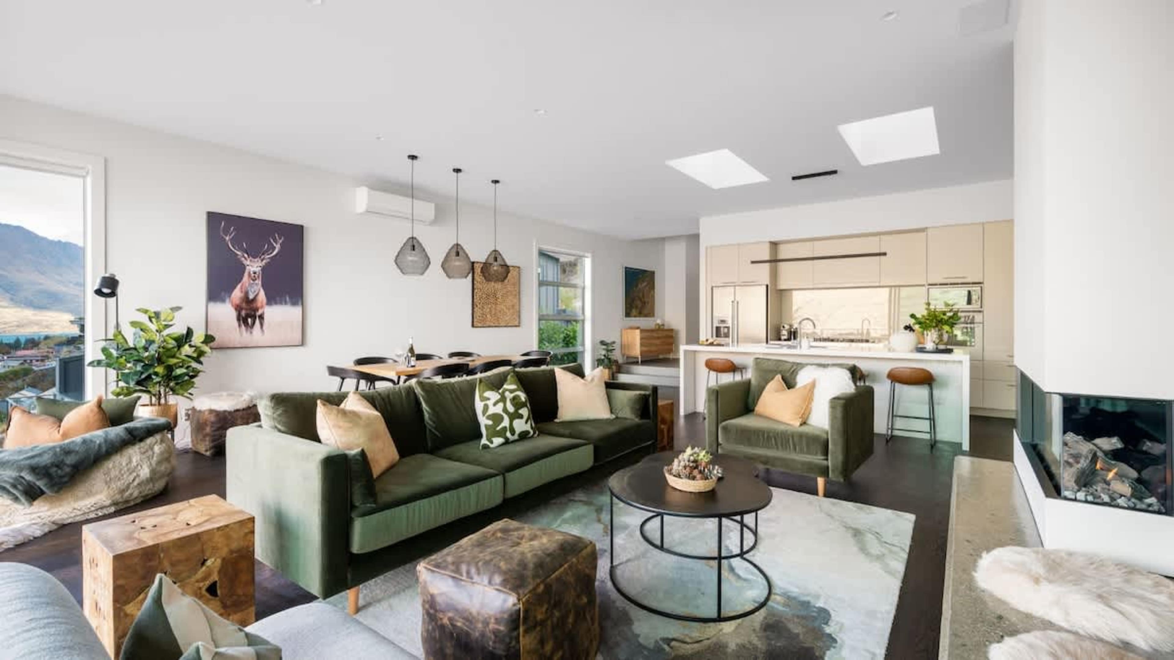 Refined Living Room with Scenic Views
Enjoy a stylish, newly refurbished living room with expansive views, a gas fire, AC, and heat pump, creating an inviting and luxurious atmosphere for all to enjoy.