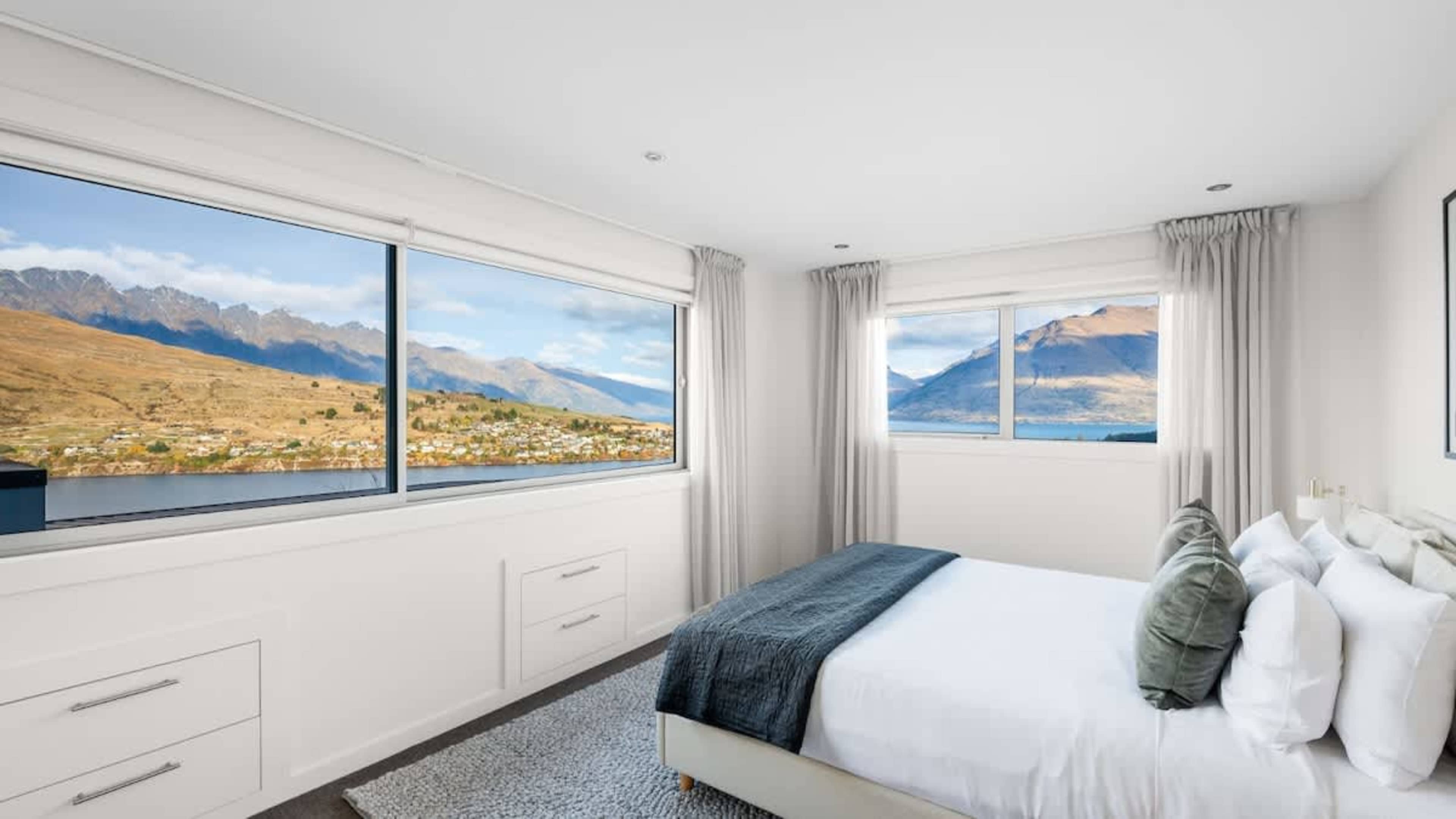 Master Bedroom with Walk-In Wardrobe, Ensuite, and Scenic Views
Unwind in the luxurious master bedroom, offering a walk-in wardrobe, ensuite, incredible views, and air conditioning for a peaceful and comfortable stay.