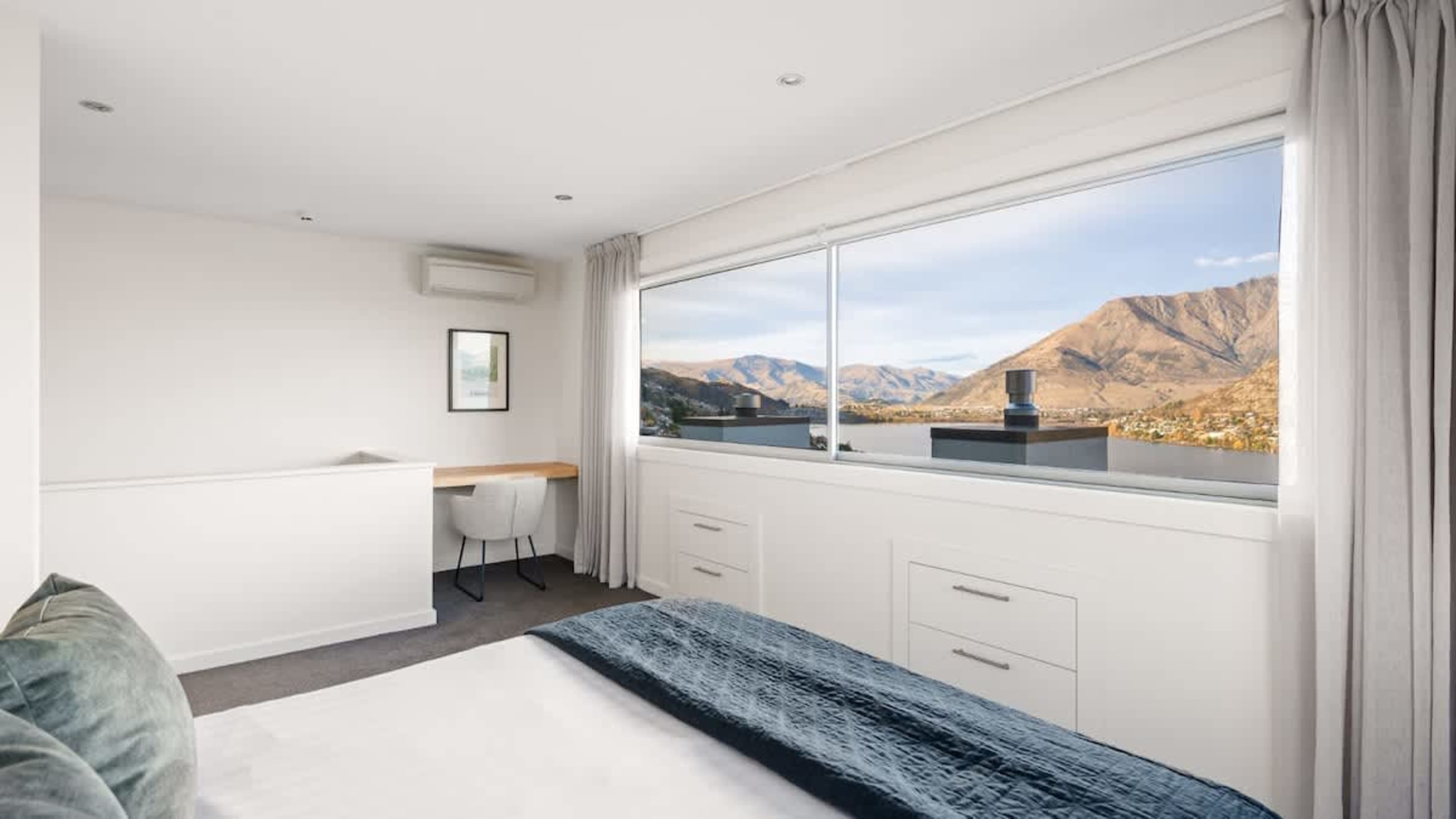 Luxurious Master Bedroom with Ensuite and Views
Retreat to the spacious master bedroom, complete with a walk-in wardrobe, ensuite, stunning views, and air conditioning for the ultimate comfort.