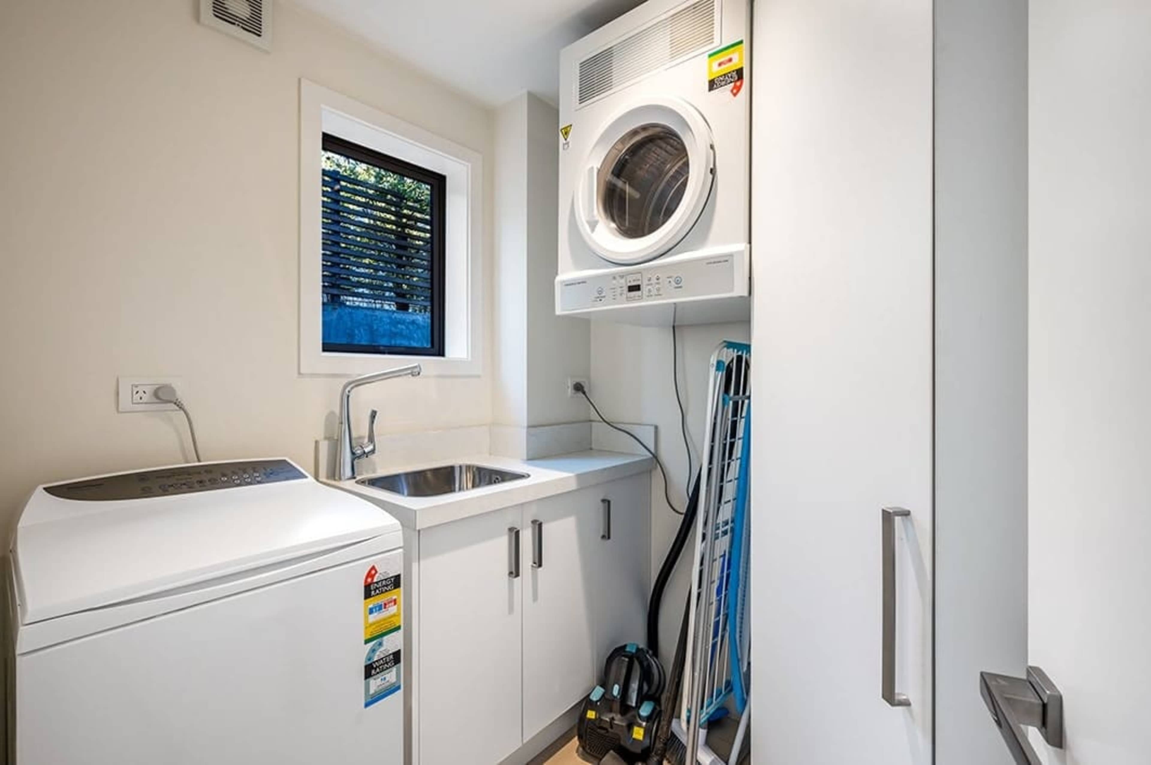 Convenient In-House Laundry Facilities
This apartment features a well-equipped laundry area, complete with a washer and dryer. Enjoy the convenience of doing laundry at your leisure, making your stay in Queenstown even more comfortable.