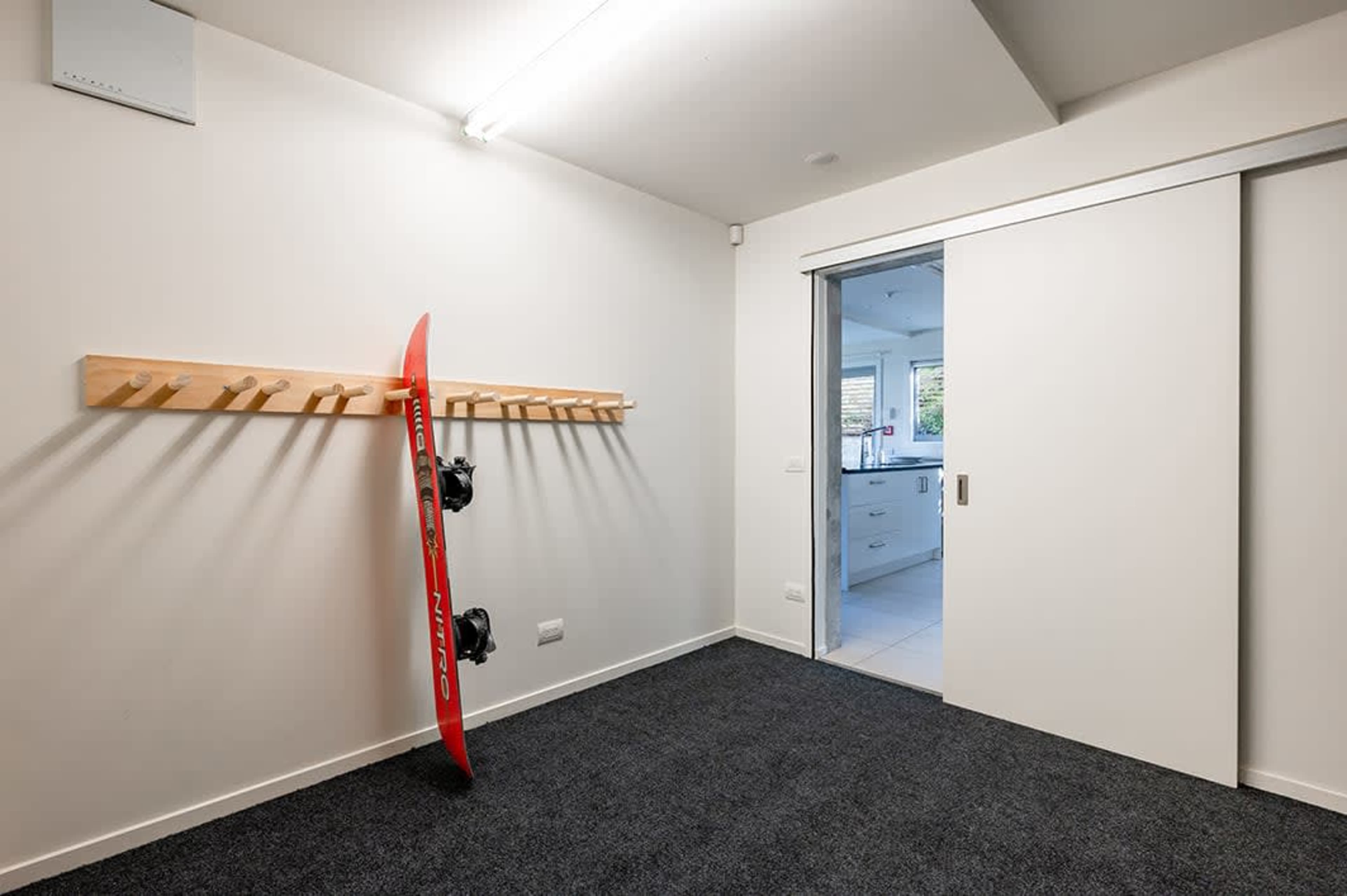Secure and Convenient Garage Space
This apartment includes a secure garage, providing ample space for your vehicle and additional storage. Enjoy the convenience of direct access to your home, making your stay in Queenstown hassle-free.