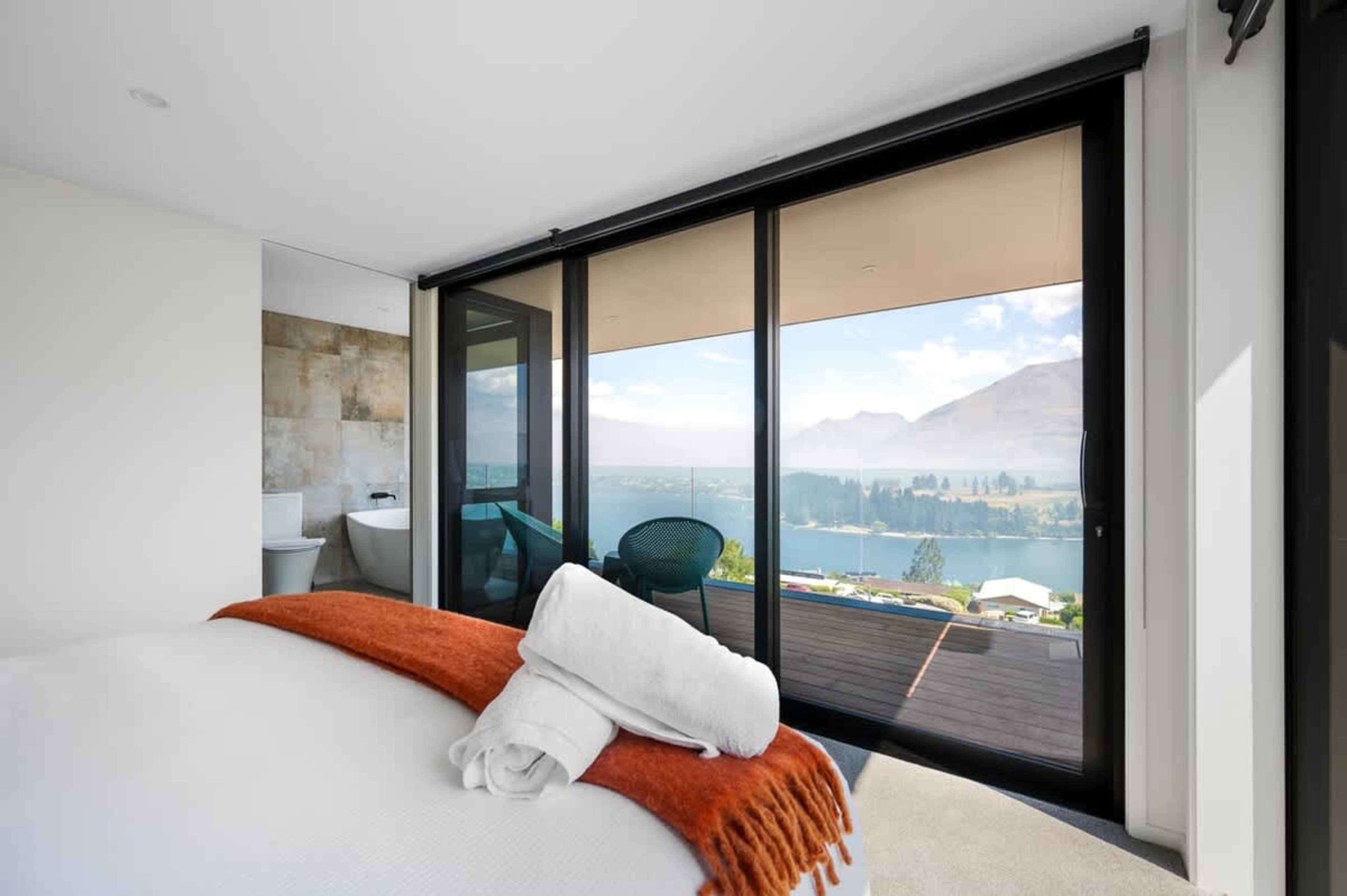 Private Master Bedroom Retreat with Patio and Views
This peaceful master bedroom includes a private patio, ensuite, and expansive views, creating an ideal space to relax and enjoy the surroundings.