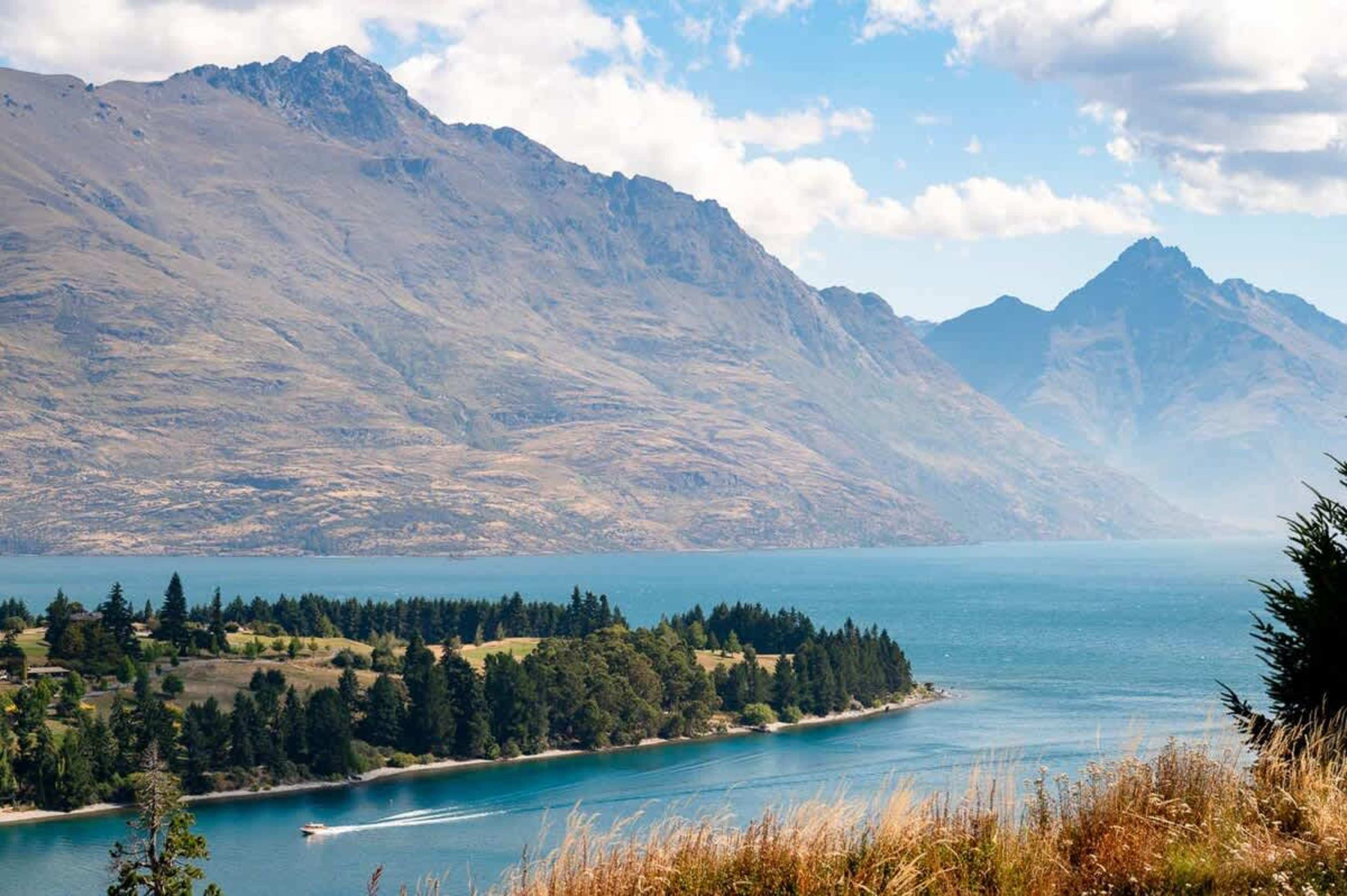 Scenic Queenstown Retreat with Private Deck
Focus on the private deck, ideal for alfresco dining and relaxation with stunning lake and mountain views.